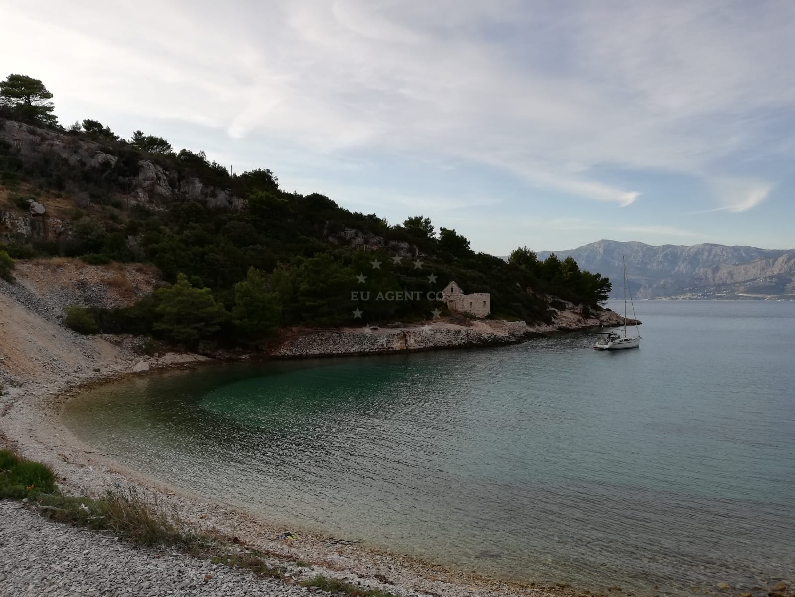 Konopjikova Anchorage in Postira, Brac, Croatia: sandy seabed with concrete blocks for mooring