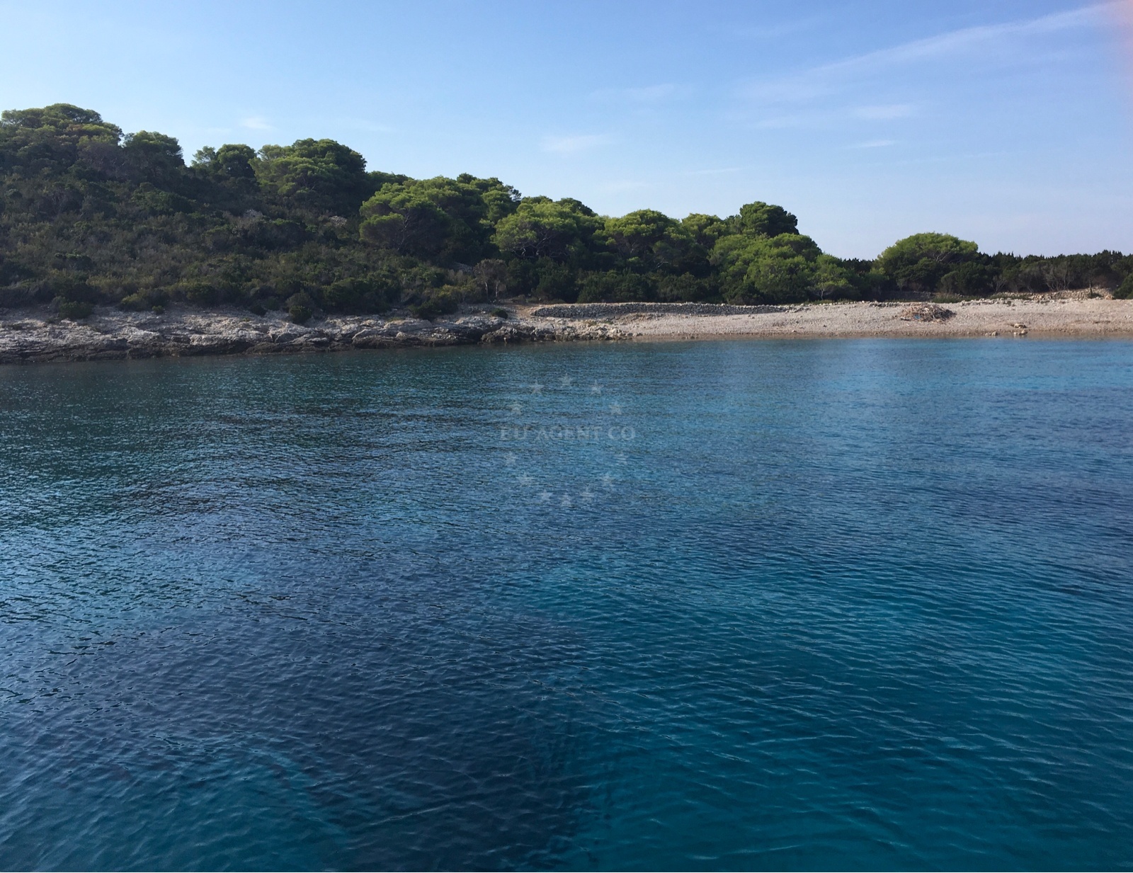 Budikovac Anchorage, Central Dalmatia Croatia. Calm waters with nearby island silhouette.