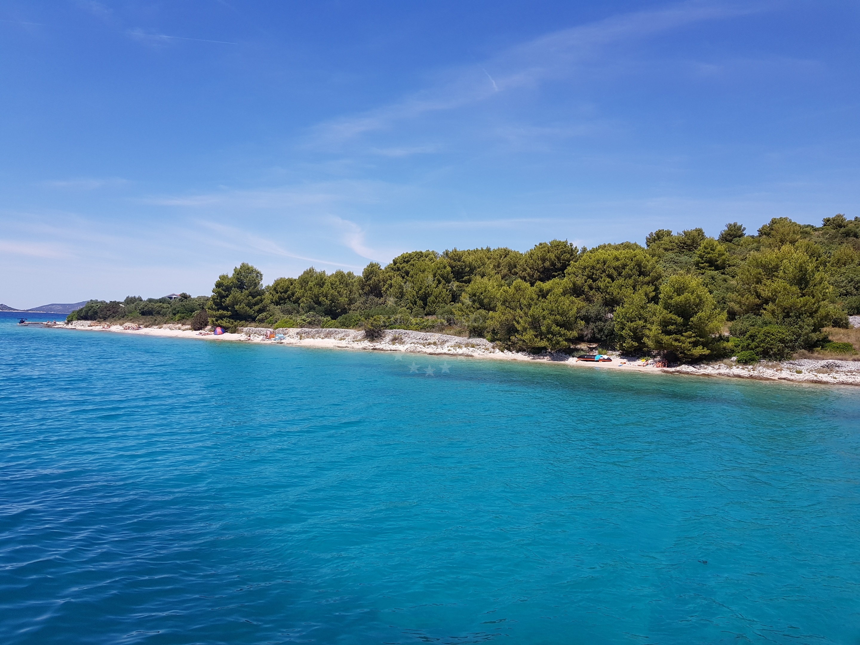 Calm waters of Ciovo Island anchorage with distant views of the Adriatic coastline