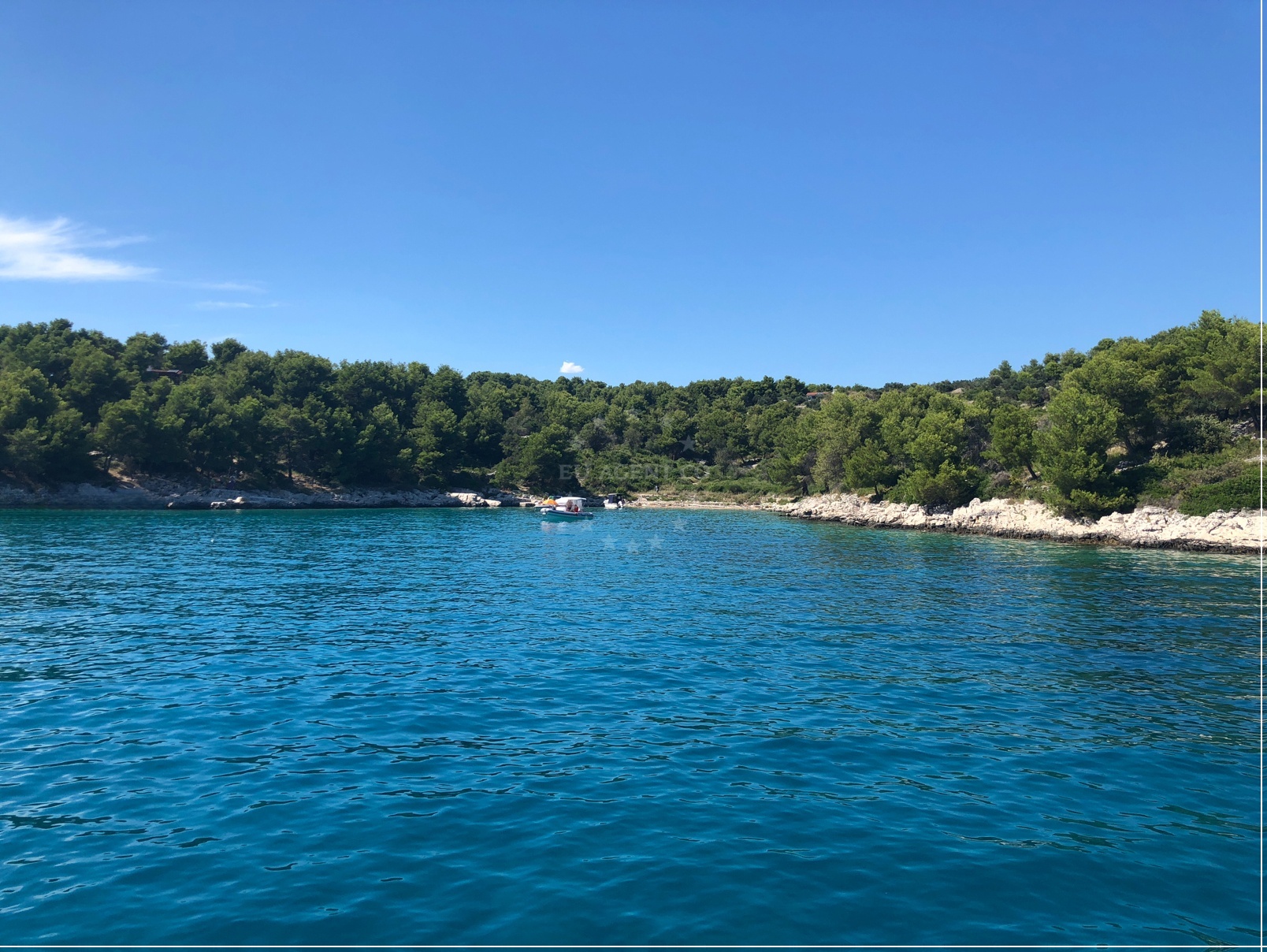 Anchorage on Čiovo Island, Croatia with views of the surrounding coastline and nearby village of Duga