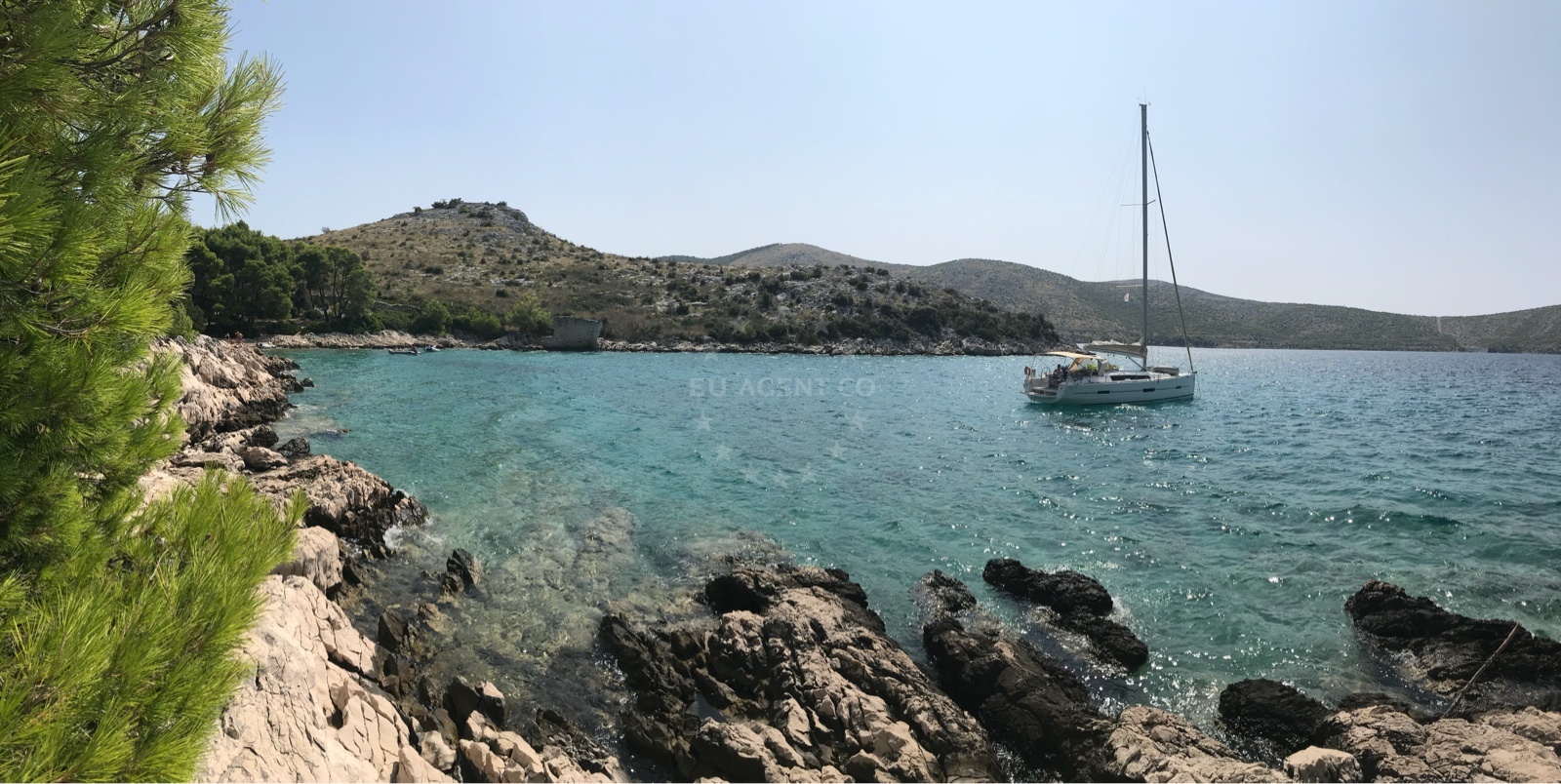 View of Luka Grebastica marina near the anchorage with yachts moored