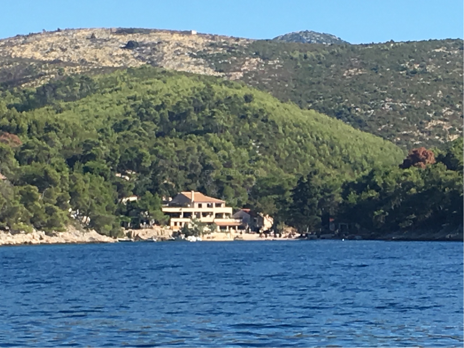 Anchorage on Hvar Island with view of Lozna village and surrounding coastal landscape