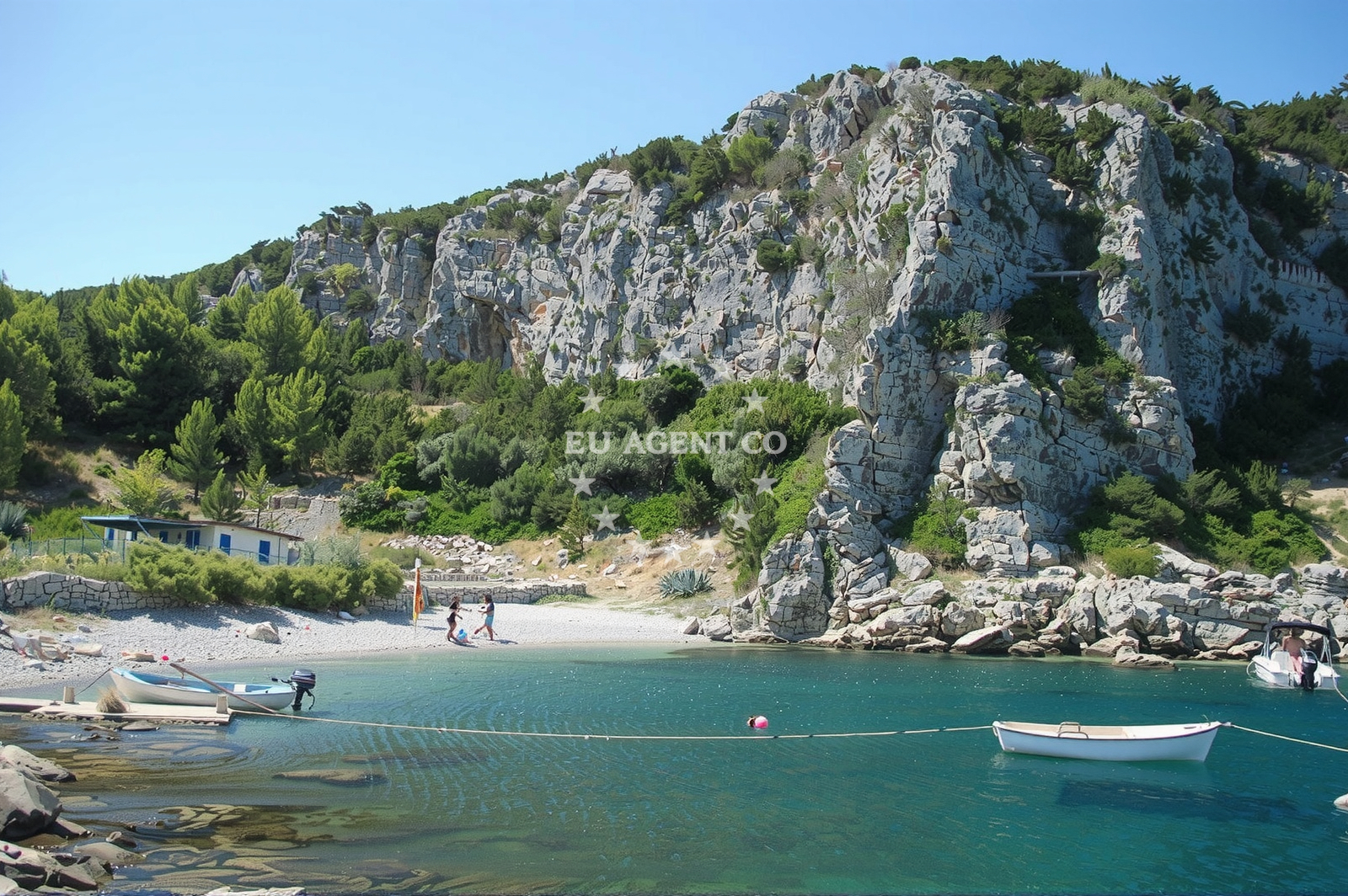 Sheltered anchorage in Pokrivenik, Hvar, with boats moored near the shore