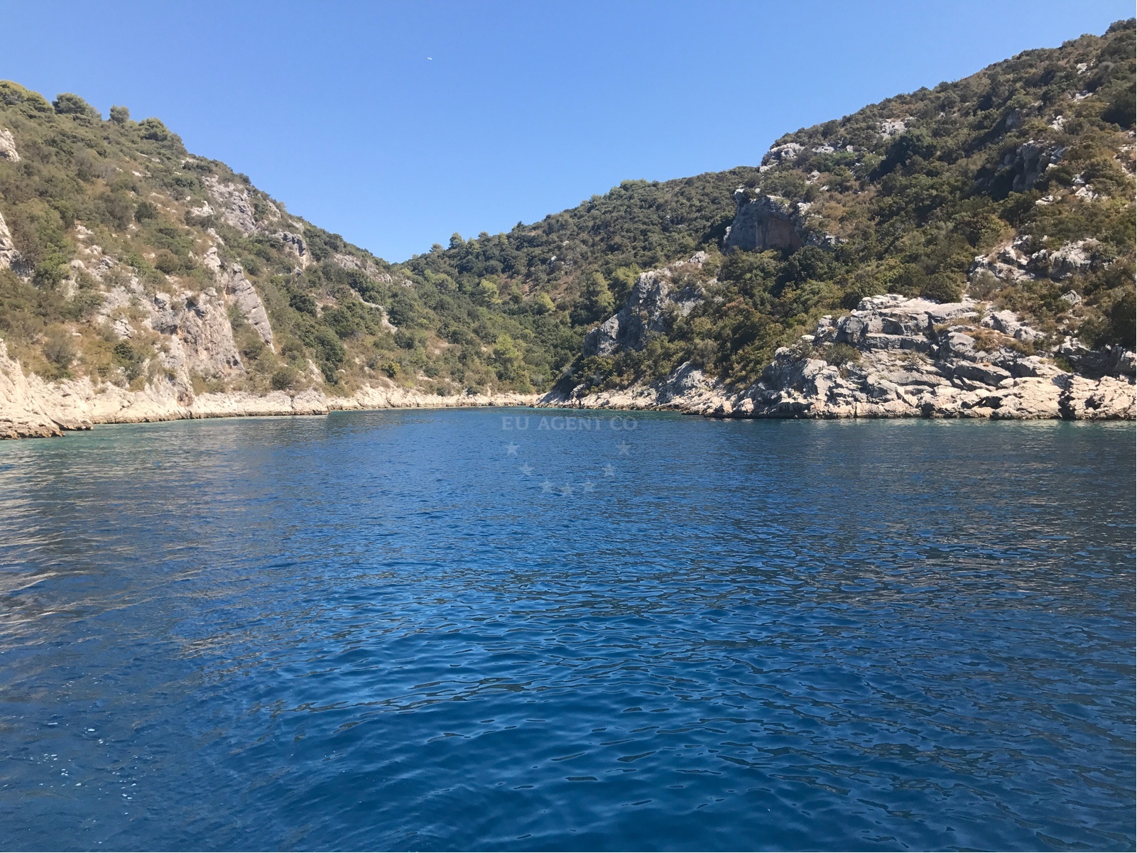 Anchorage on Šolta Island, Central Dalmatia, Croatia with clear waters and nearby Senjska