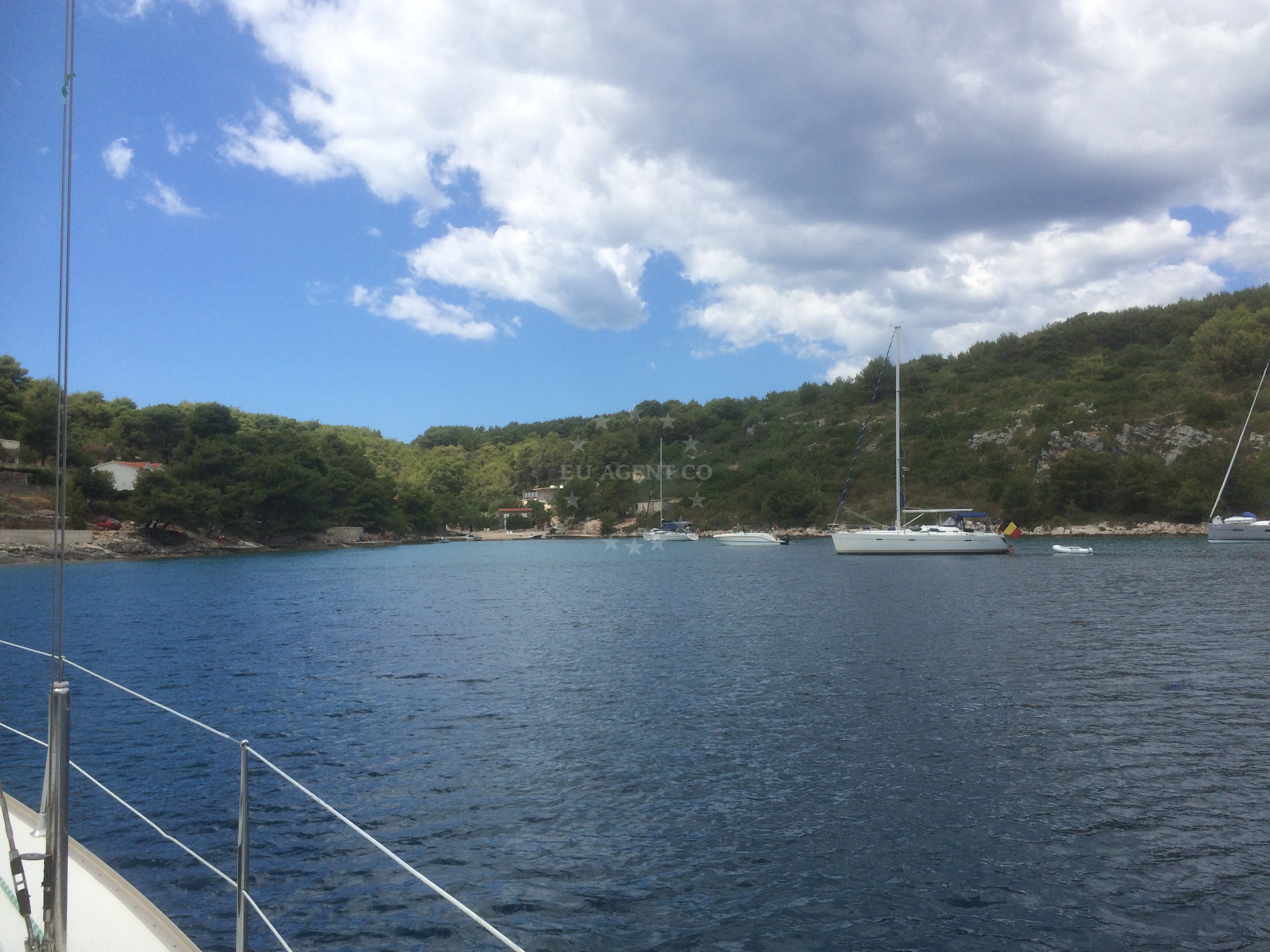 Anchorage in Necujam, Šolta, Croatia with boats moored near the shore