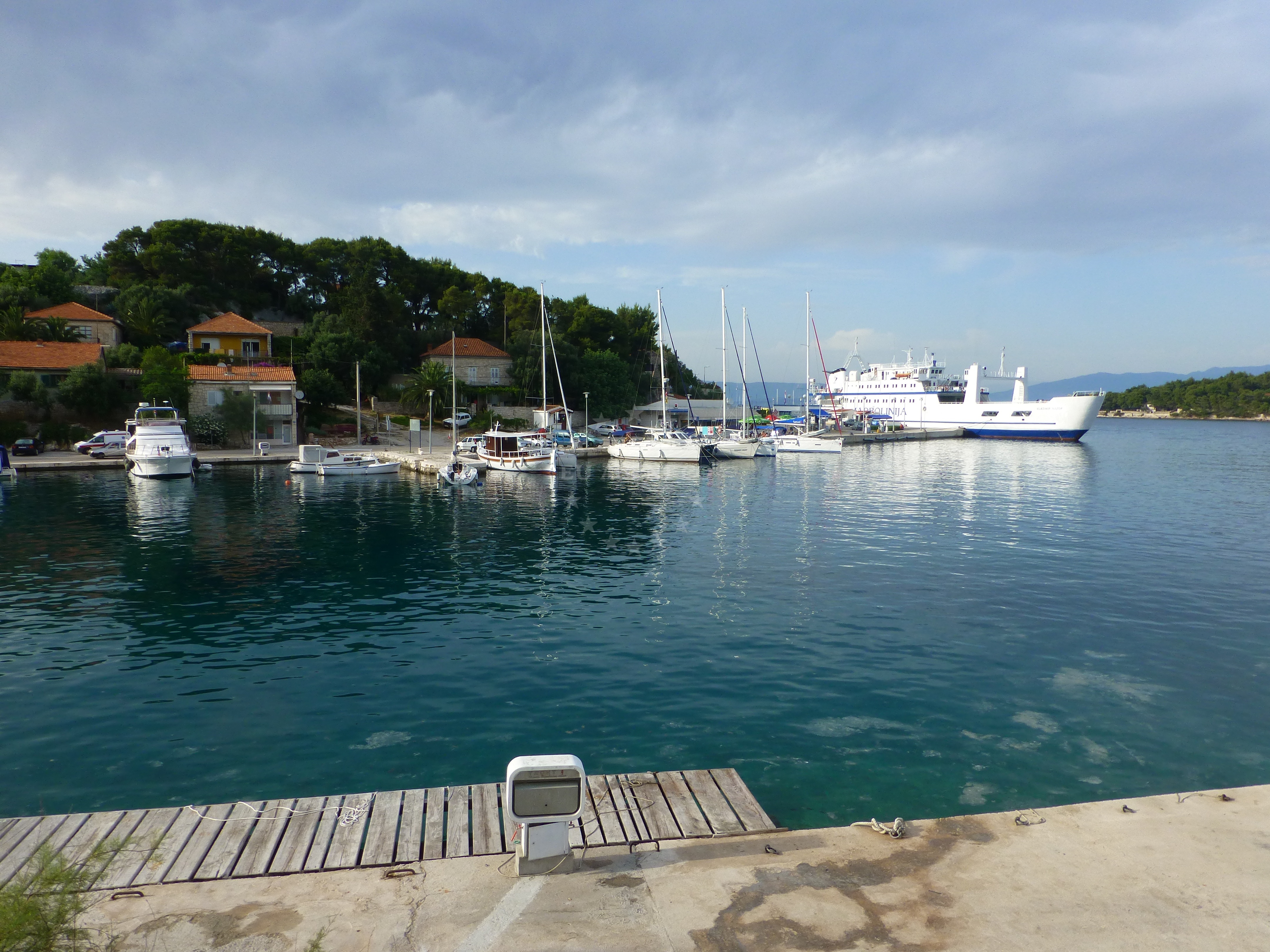 Anchorage in Rogac, Solta, Croatia with calm waters and nearby coastline
