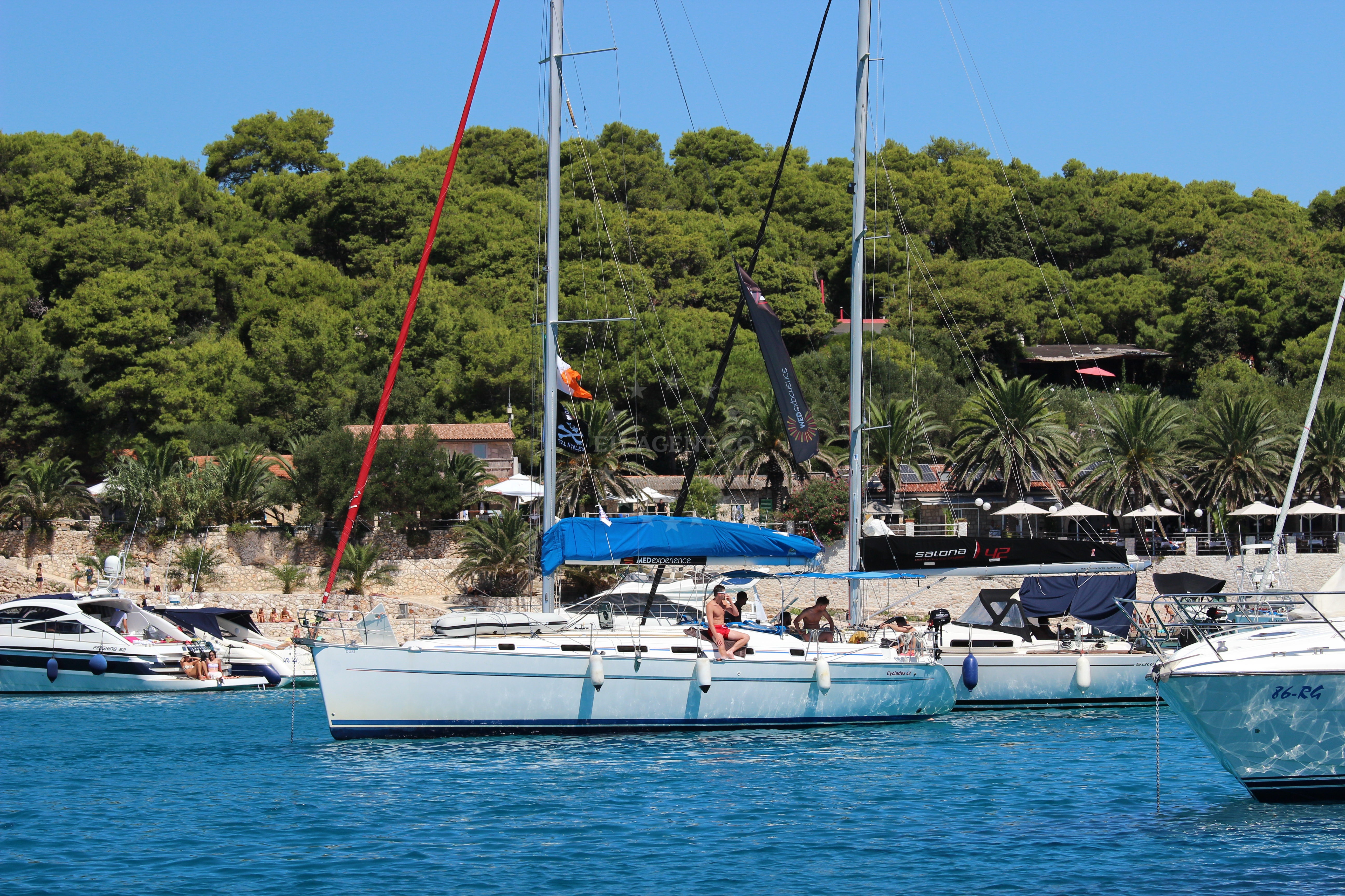 Yachts anchored near the shoreline of Vinogradisce Bay