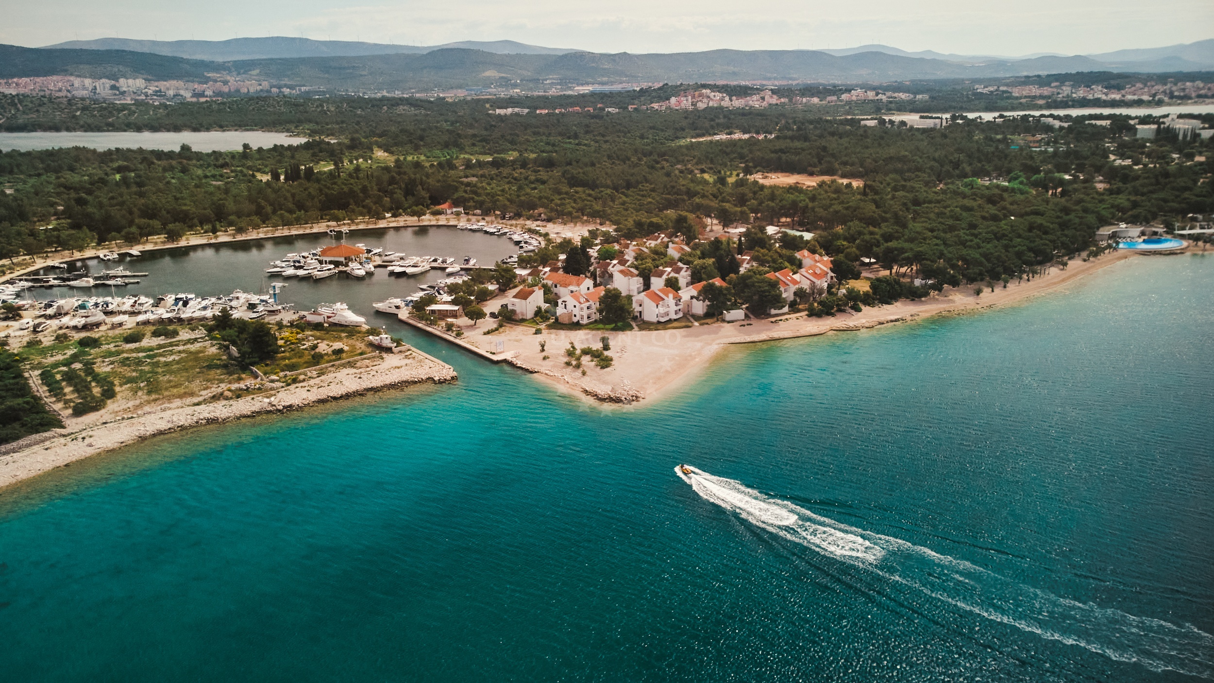 Sailboat anchored in Zaboric, Croatia with calm waters