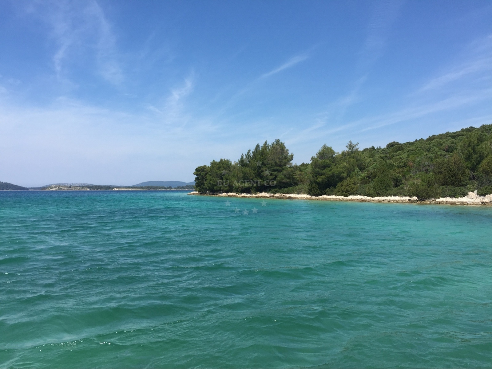 Anchorage in Zaboric, Central Dalmatia, Croatia with sandy seabed and nearby Musorovica