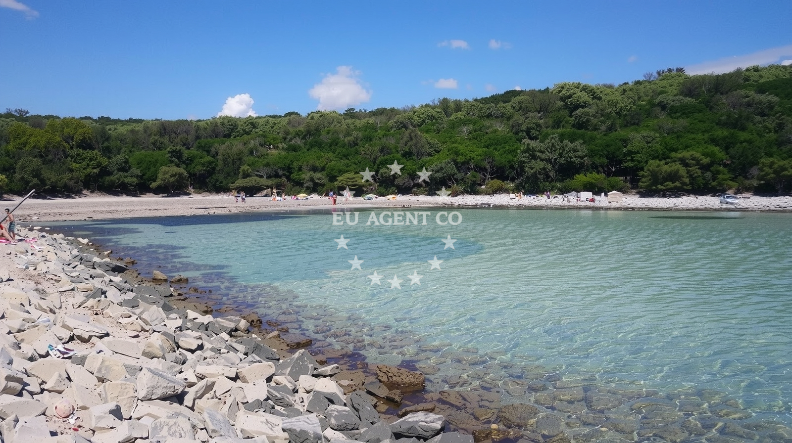 Yacht anchored at Cres Island AE38 with distant view of Cres town