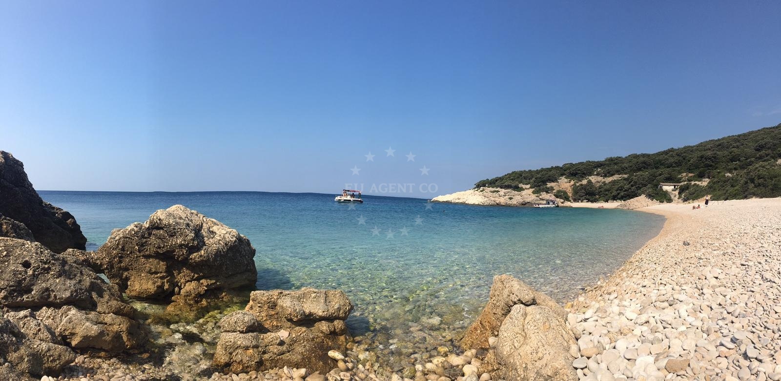 Sv. Ivan Anchorage in Lubenice, Cres, Croatia with a pebble beach and clear waters