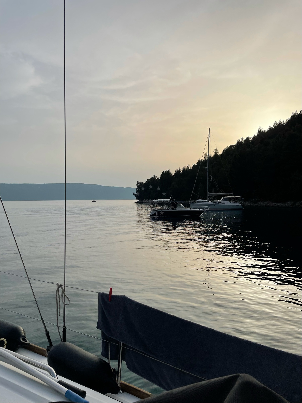 View of Nedomisje Anchorage from the shore, showing proximity to Nava Beach