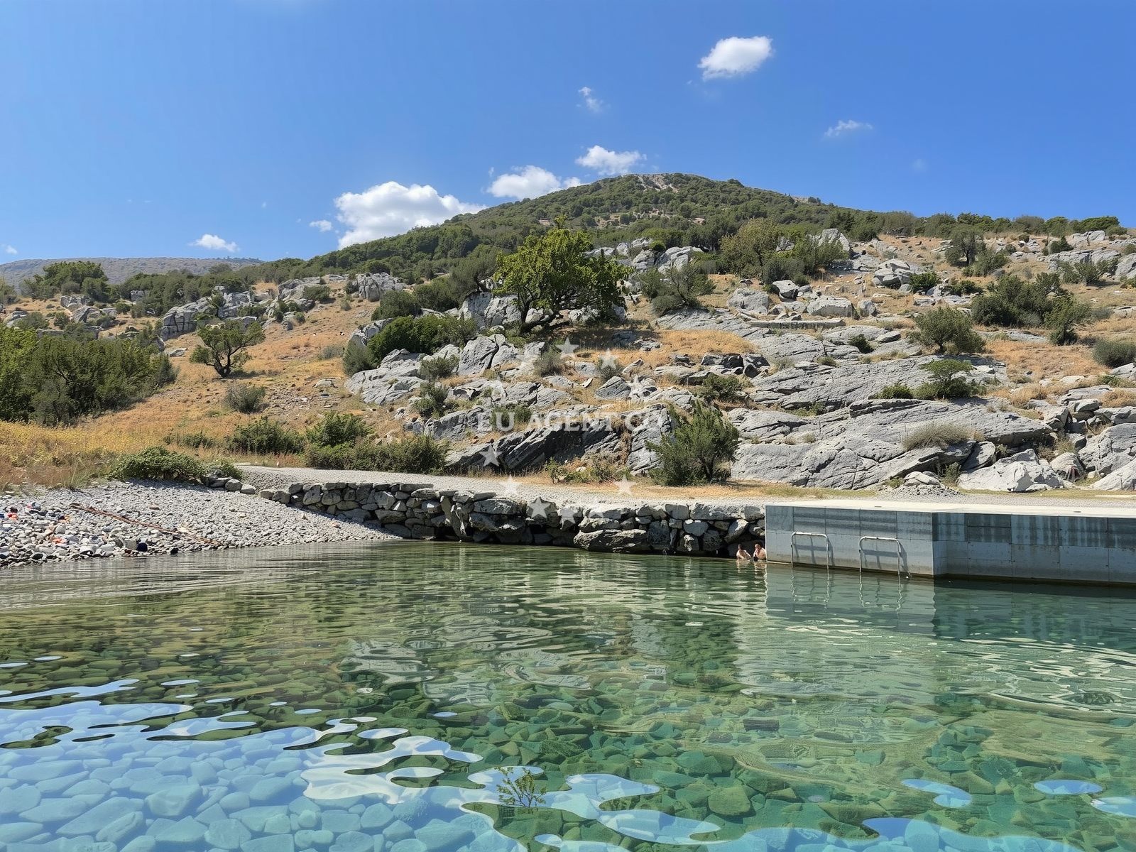 Anchorage on Krk Island with sandy seabed and distant view of Zavratnica