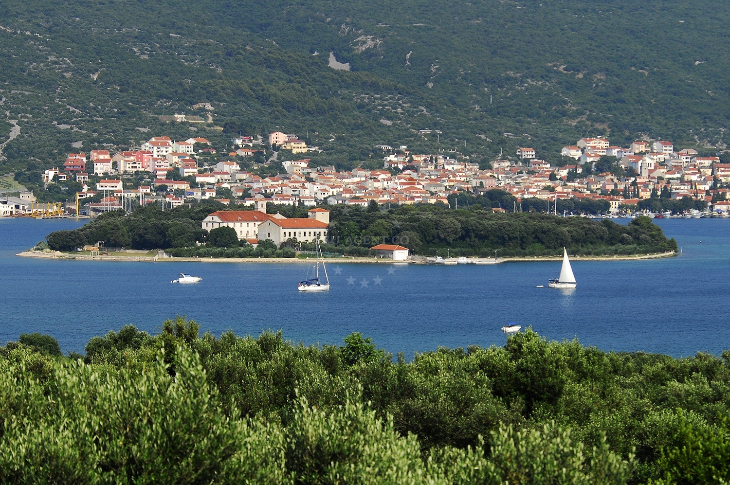 Anchorage in Punat, Krk with views of Puntarska Cove and Punat village