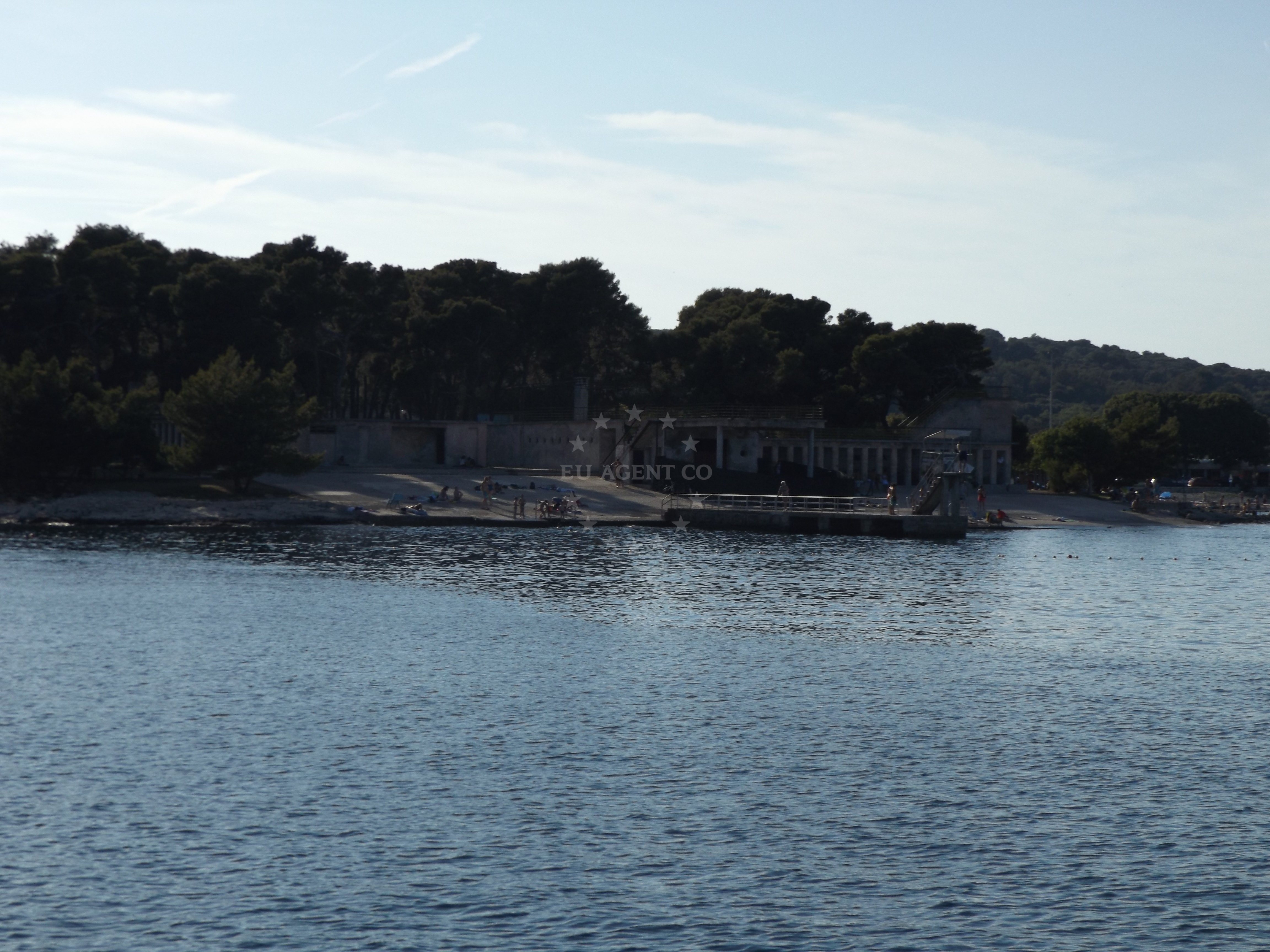 Anchorage in Pula, east of Stoja Campsite with calm waters and surrounding coastal landscape