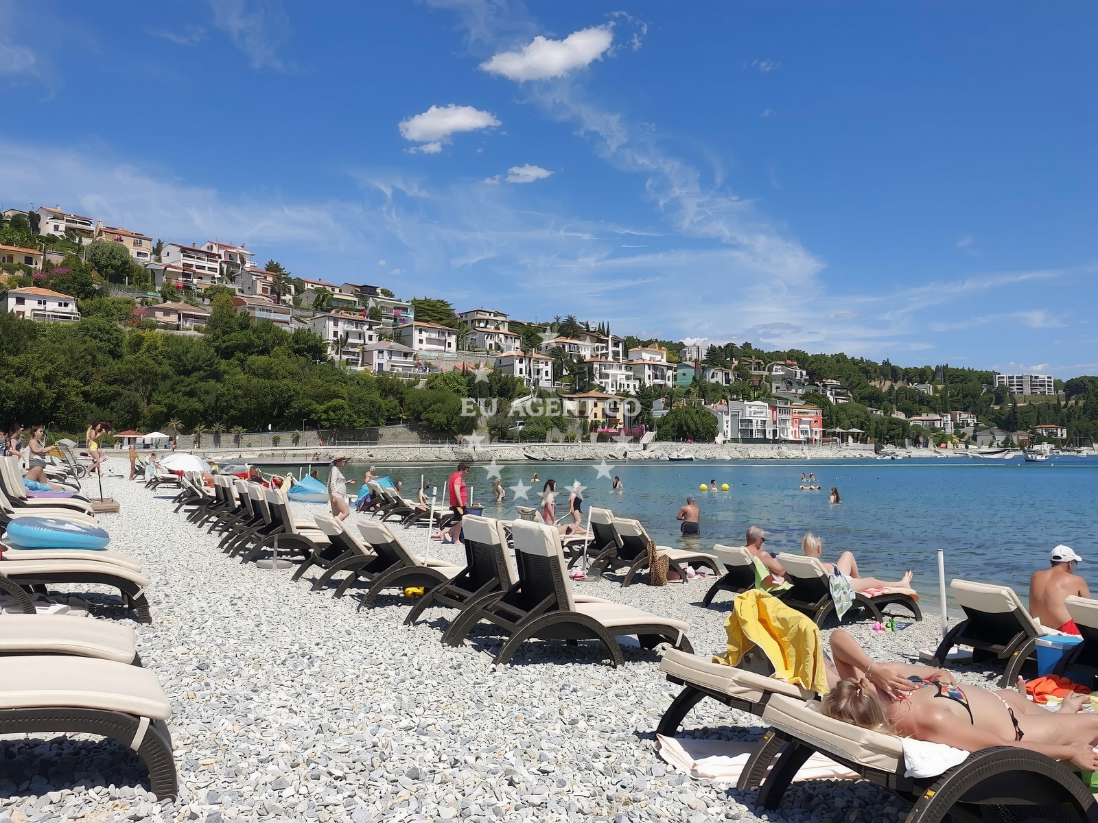 Rabac town, Croatia, with views of the Adriatic Sea and nearby marina.