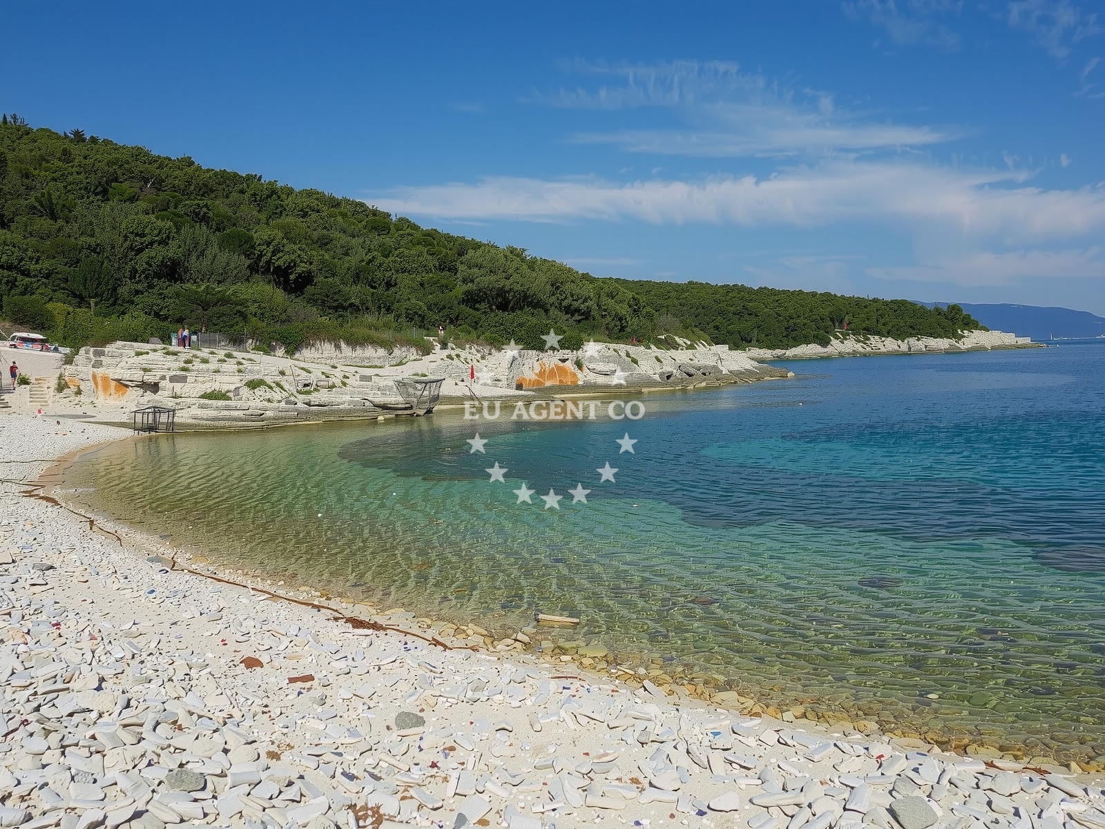 Sandy seabed anchorage in Rakalj, Croatia with distant view of Kaval