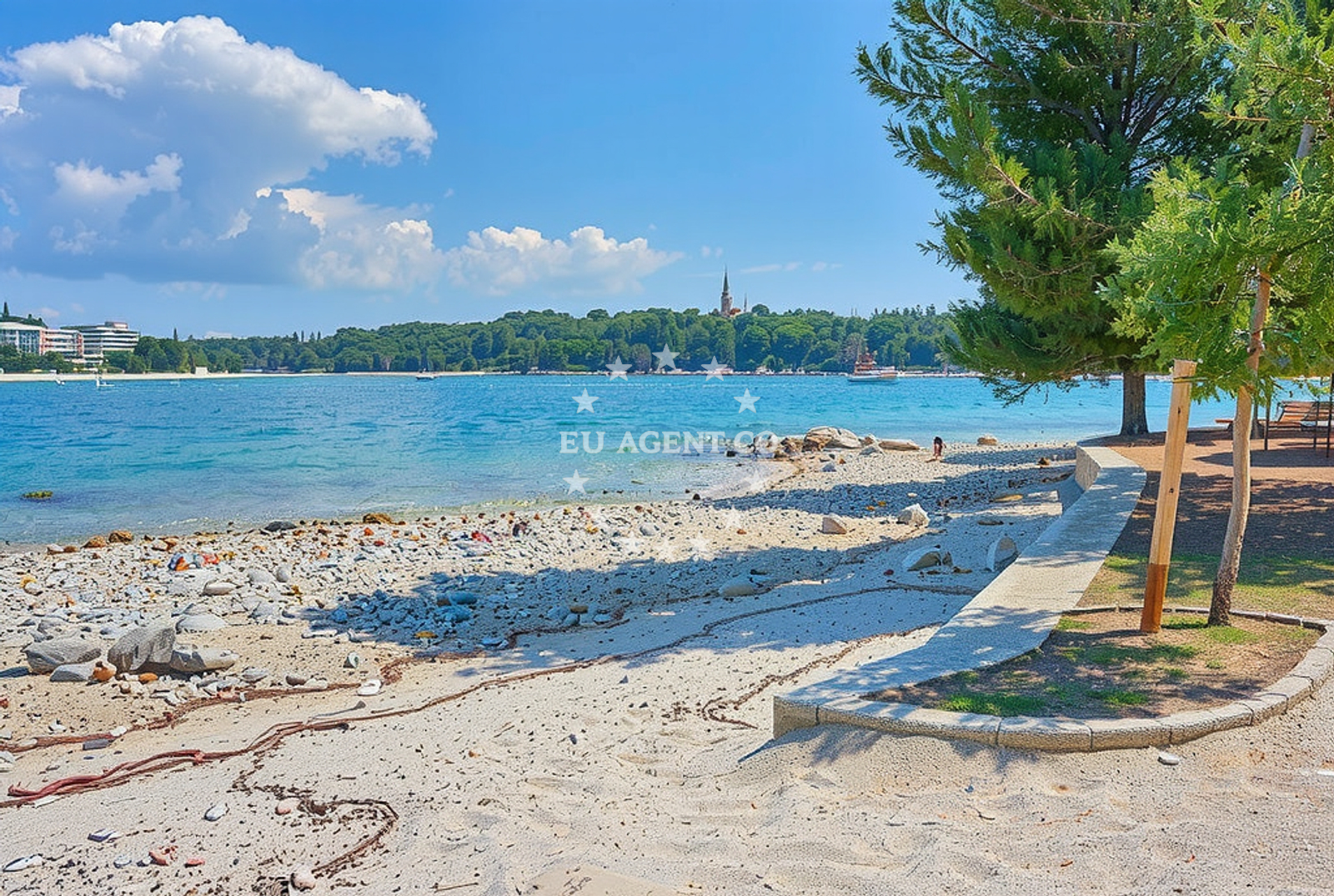 Lon Bay, Rovinj, Croatia with clear waters and nearby yacht anchorage