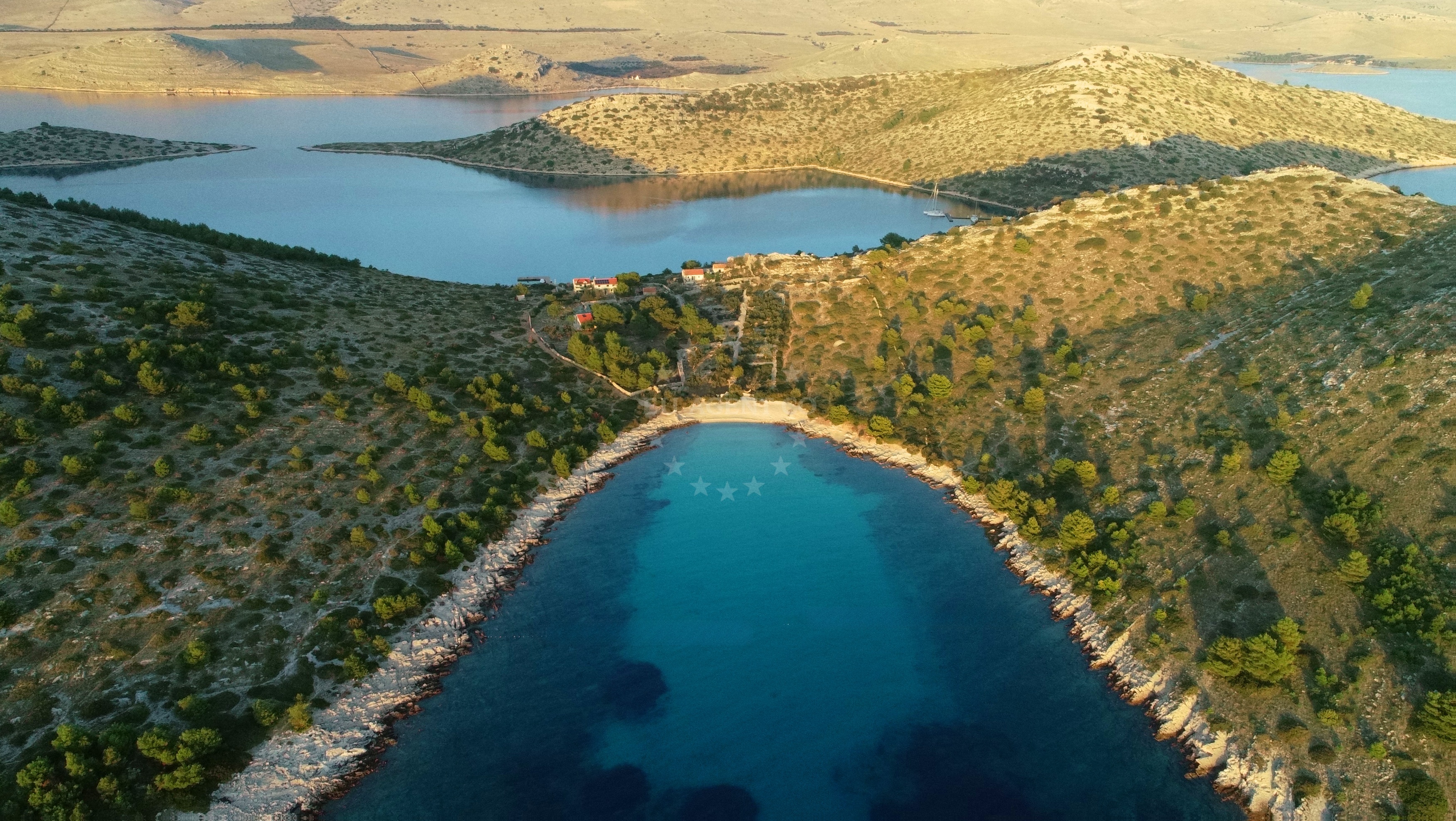 Sandy seabed and calm waters at Lojena Anchorage, Levrnaka, Croatia