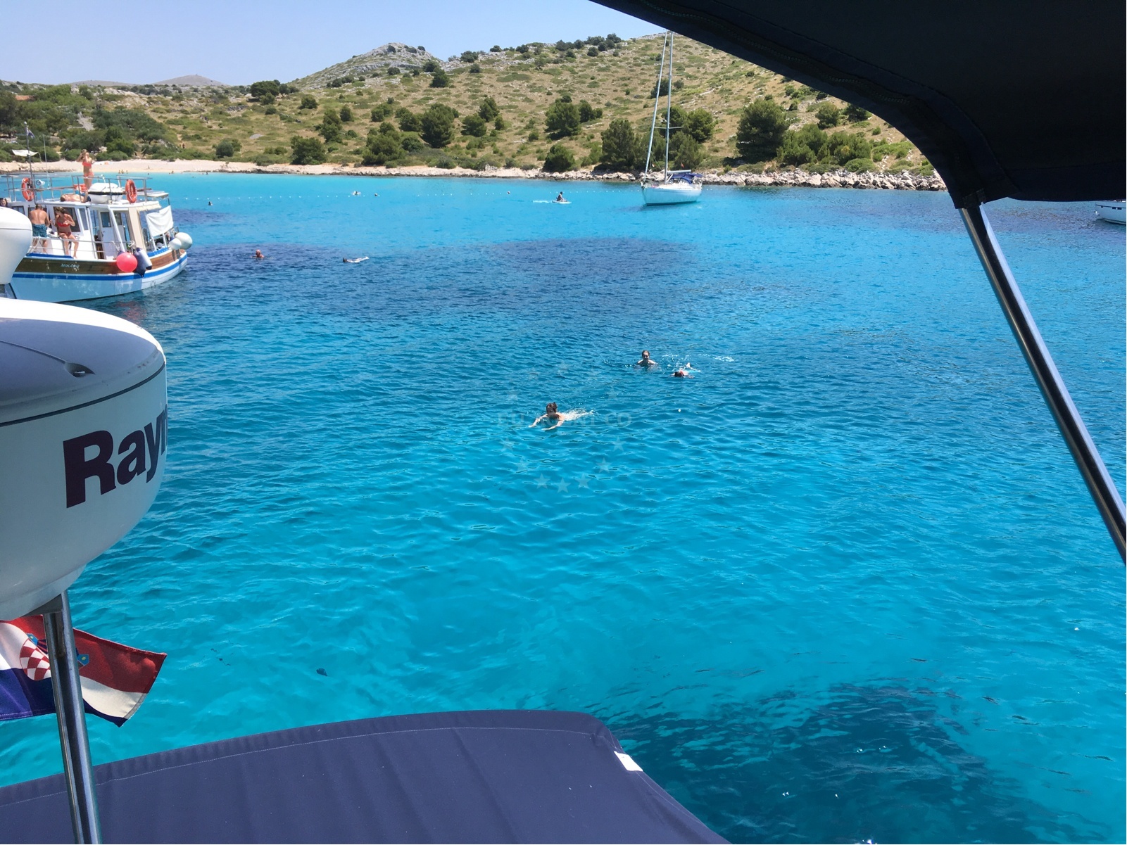 Yacht anchored at Lojena, Levrnaka, Croatia with clear waters and natural surroundings