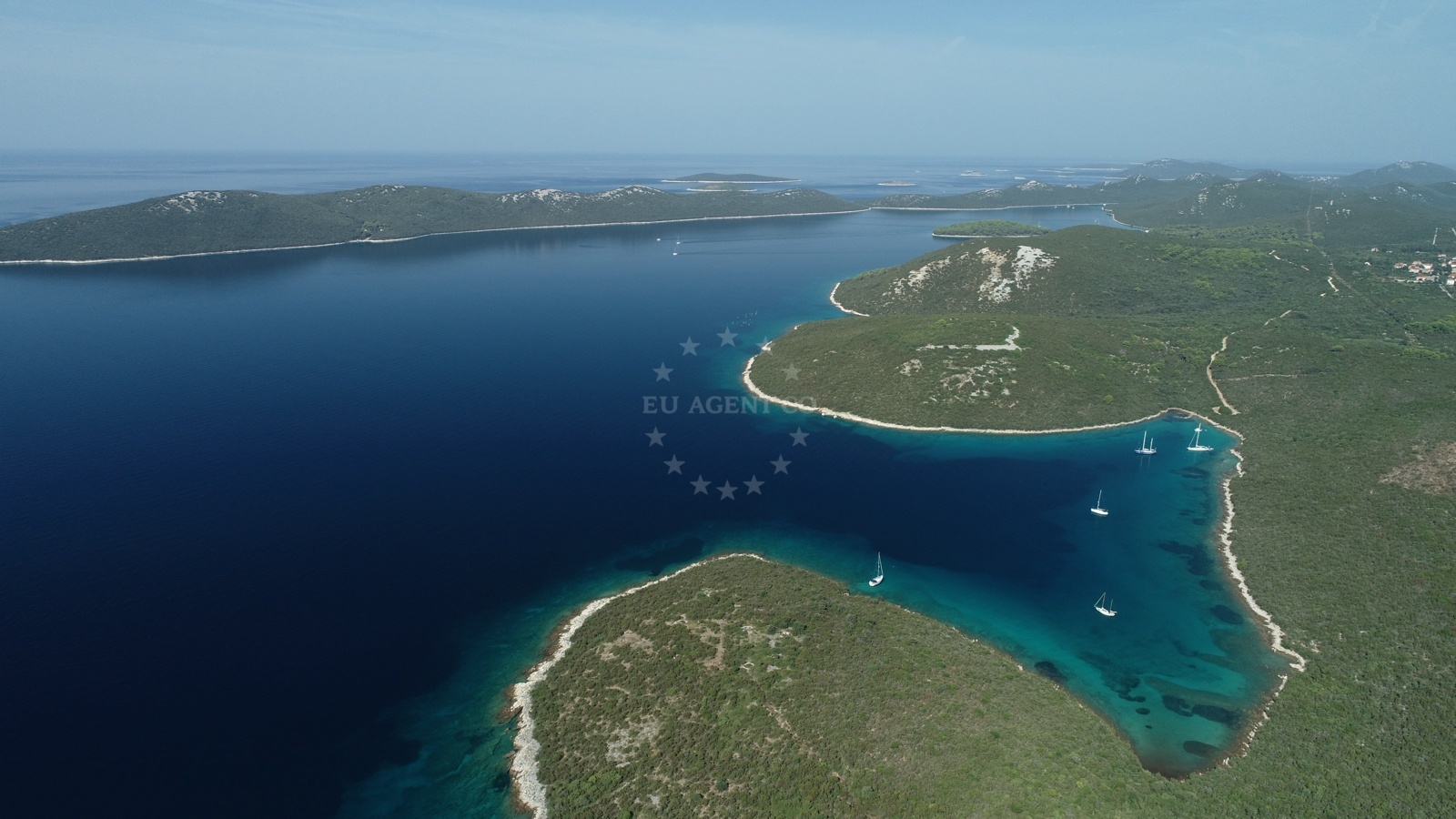 Anchorage on Molat Island, North Dalmatia, Croatia, with sandy seabed and seaweed patches
