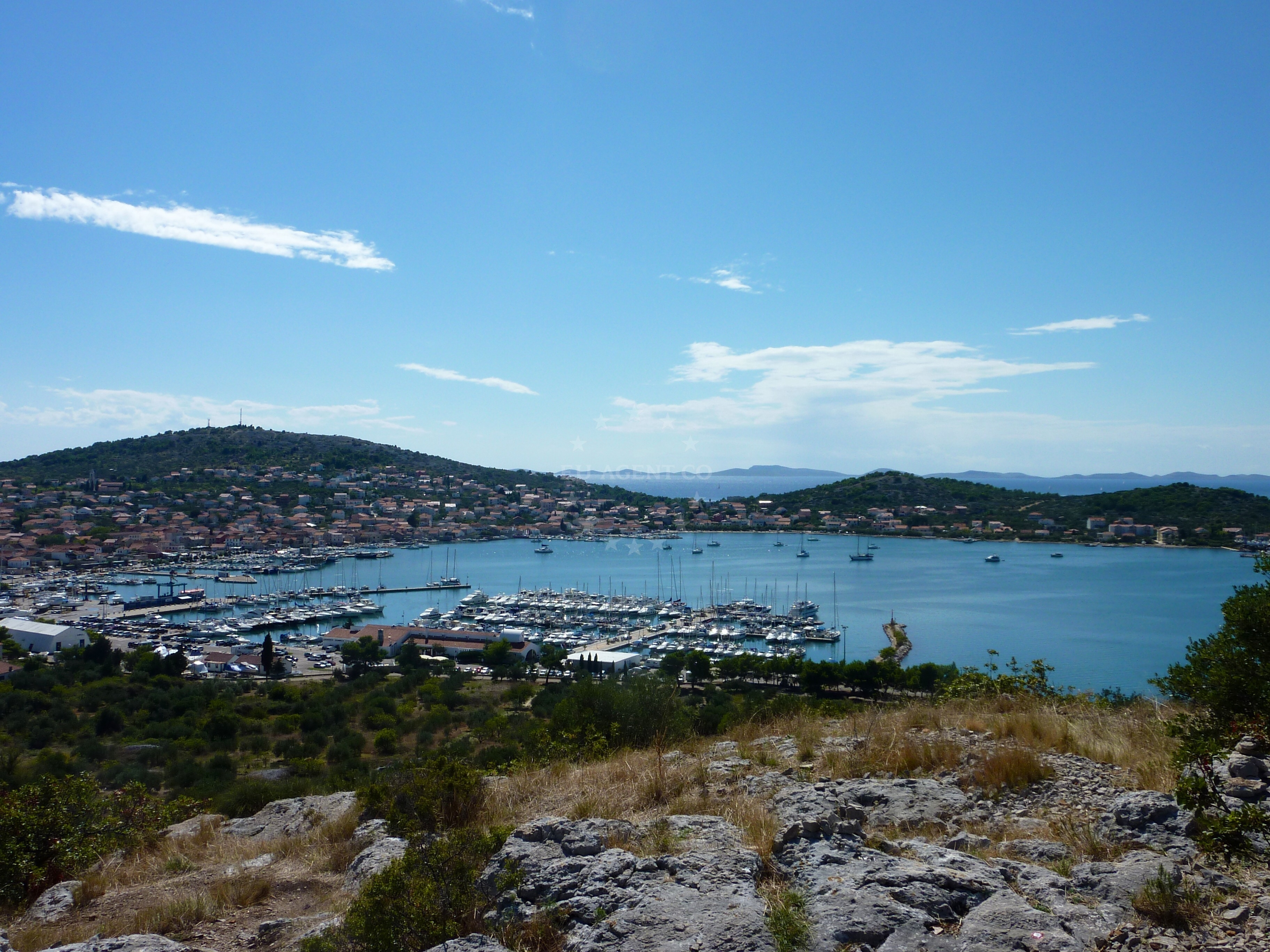 Anchorage in Murter, North Dalmatia, Croatia, with nearby Marina Hramina and village of Murter in the distance