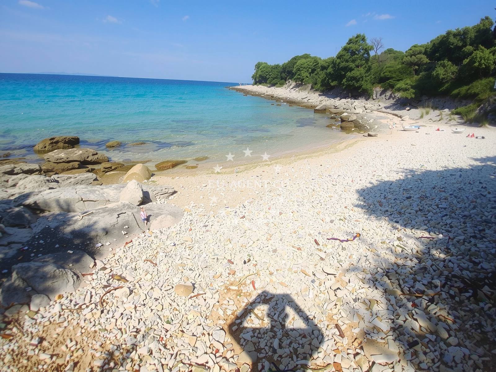Anchorage in Skunca, Pag, Croatia with calm waters and nearby coastal views
