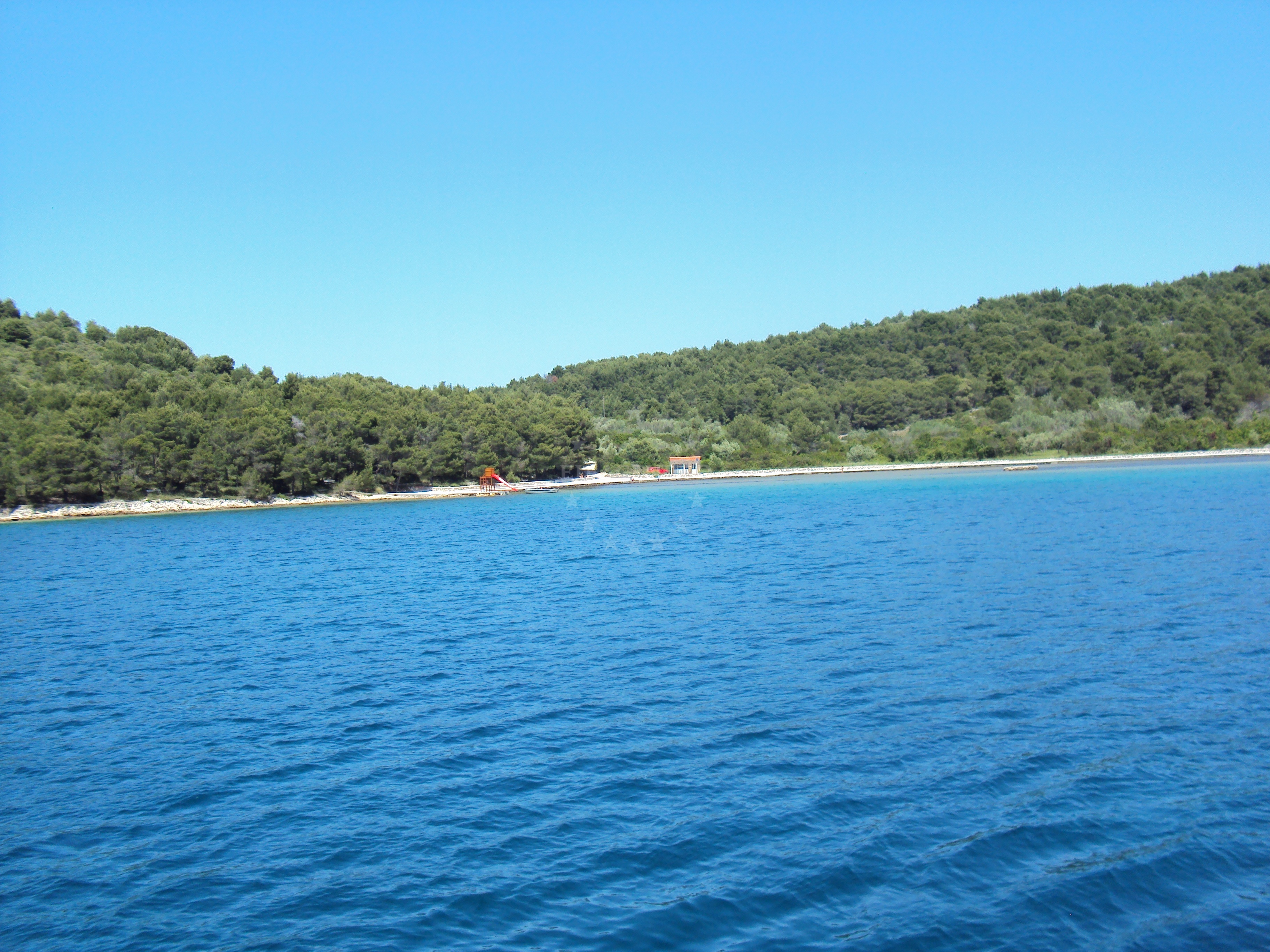 Anchorage in Kukljica, Ugljan, North Dalmatia, Croatia with sandy seabed and nearby Sabušica