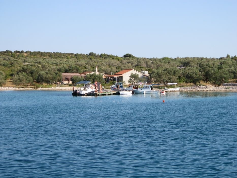 Yacht anchored near the fish farm on Zizanj Island, North Dalmatia