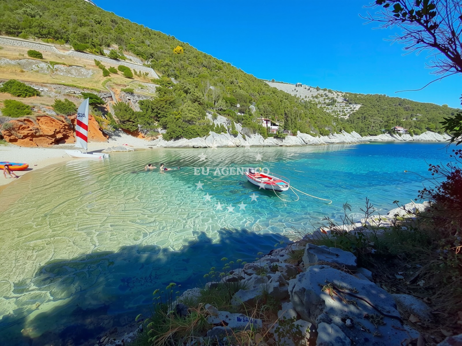 Sandy seabed anchorage near Korcula Island with seaweed patches