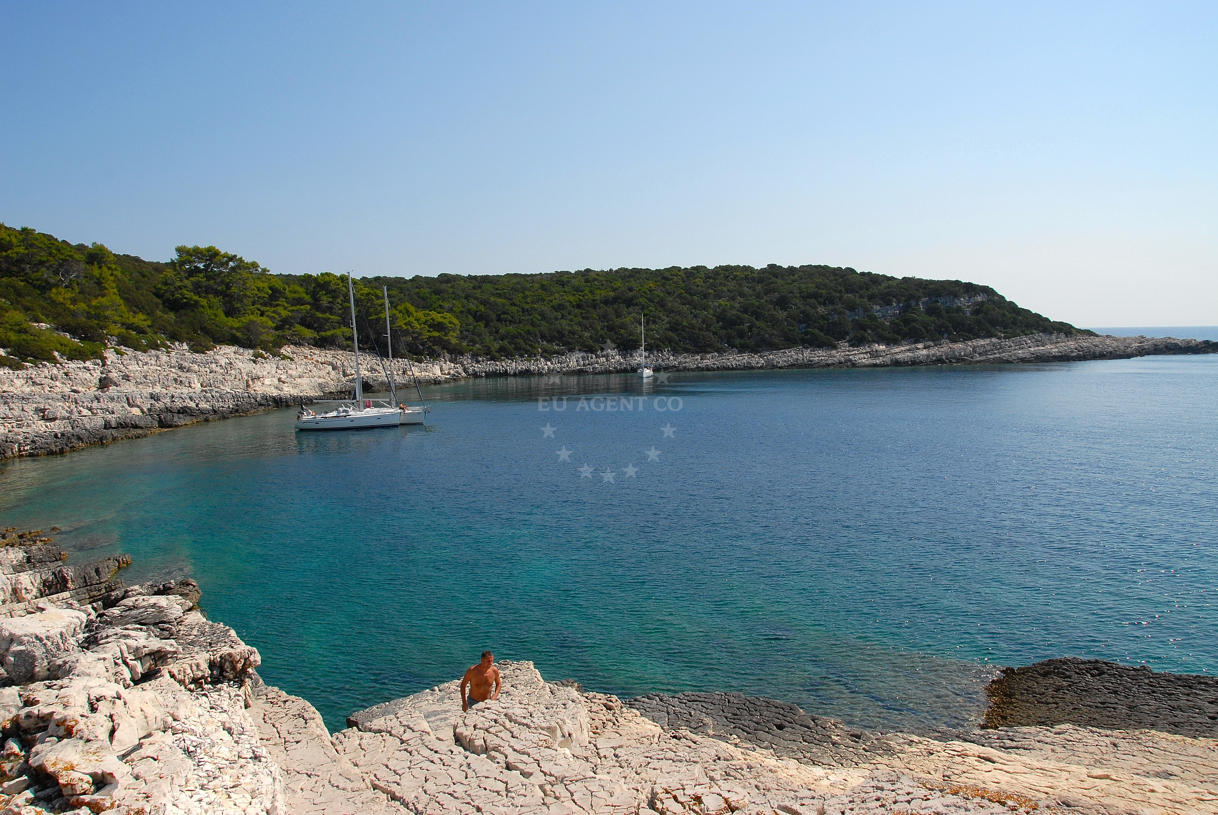 Boats anchored at Cesvinica, Lastovnjaci, with distant views of Lastovo Island and Adriatic Sea