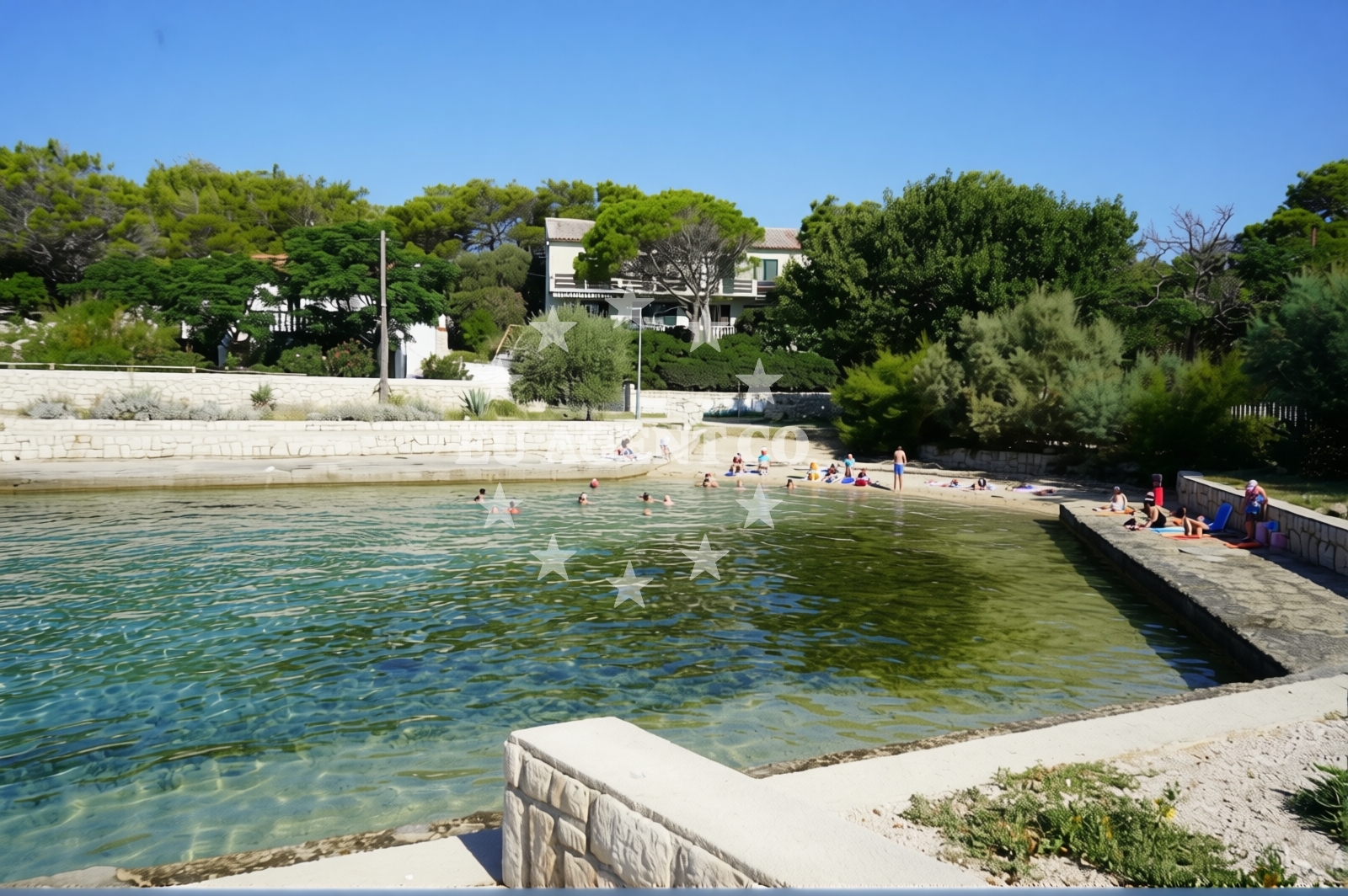 Shoreline and swimming area at Camp Kosljun Beach in Put Košljuna 12, Pag