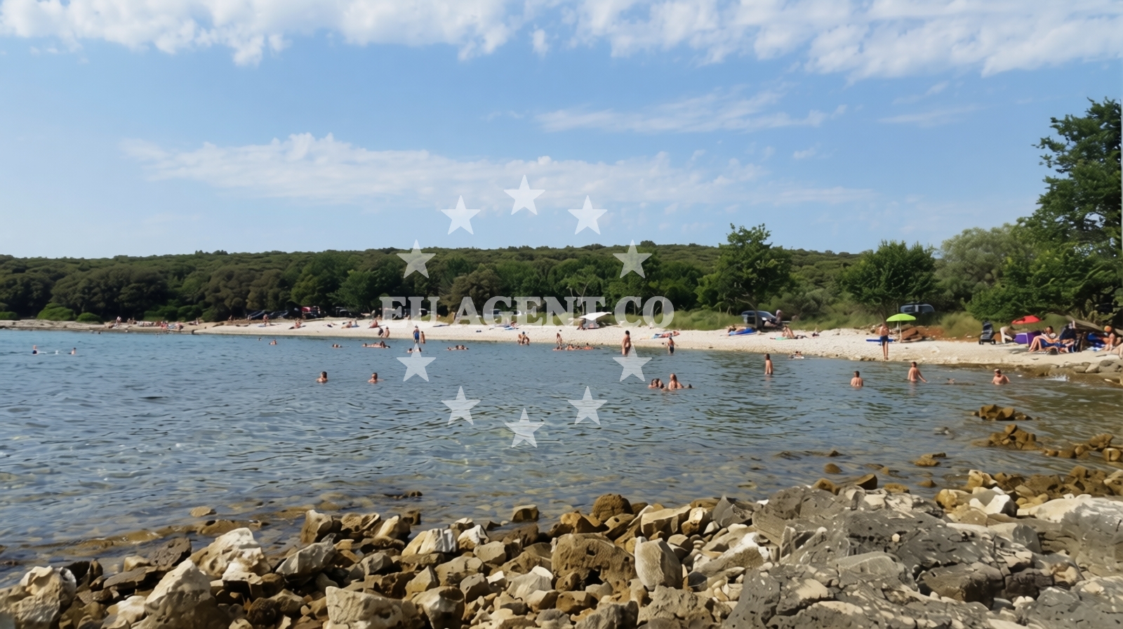 Shoreline and swimming area at Cisterna beach in , Rovinj