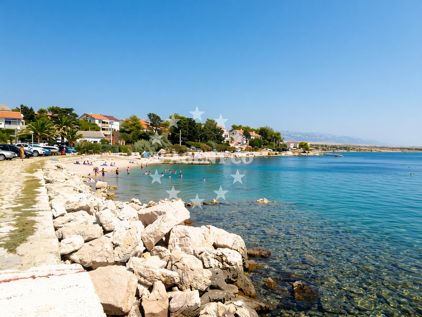 Shoreline and swimming area at Cochineal beach in 23 Kosljun, Košljun