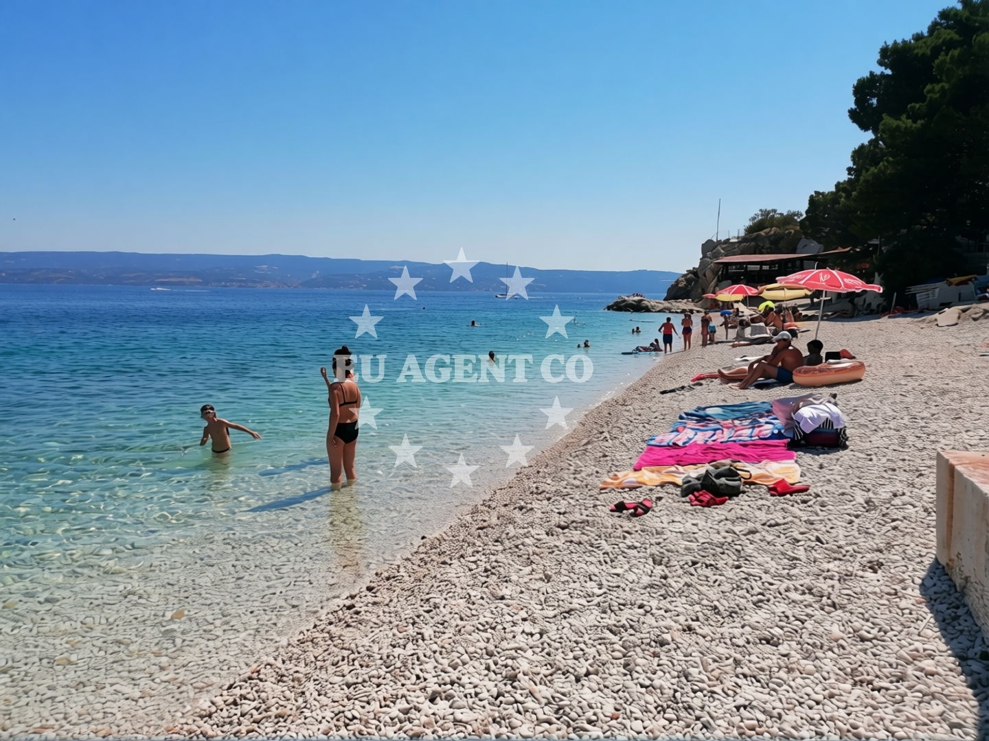 Shoreline and swimming area at Dugi Rat Beach in Poljička Cesta 63, Duće