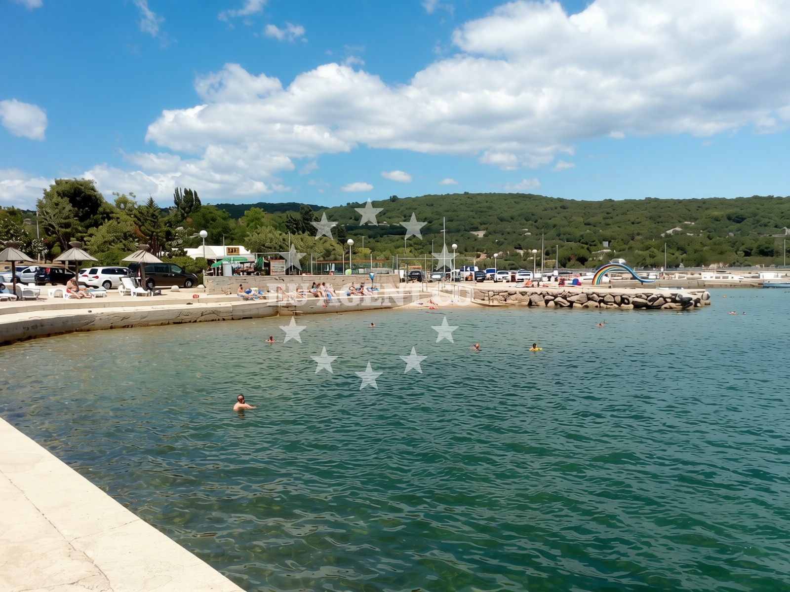 Shoreline and swimming area at Dunat beach in Placa 16 Kornić, Placa 16, Kornić