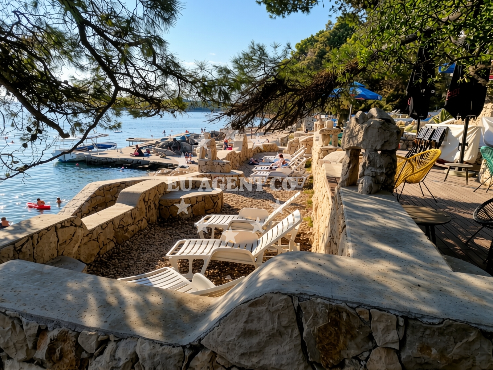 Shoreline and swimming area at Frkanj beach in KAMPOR 68 B,E,F,G Apartments, Rab