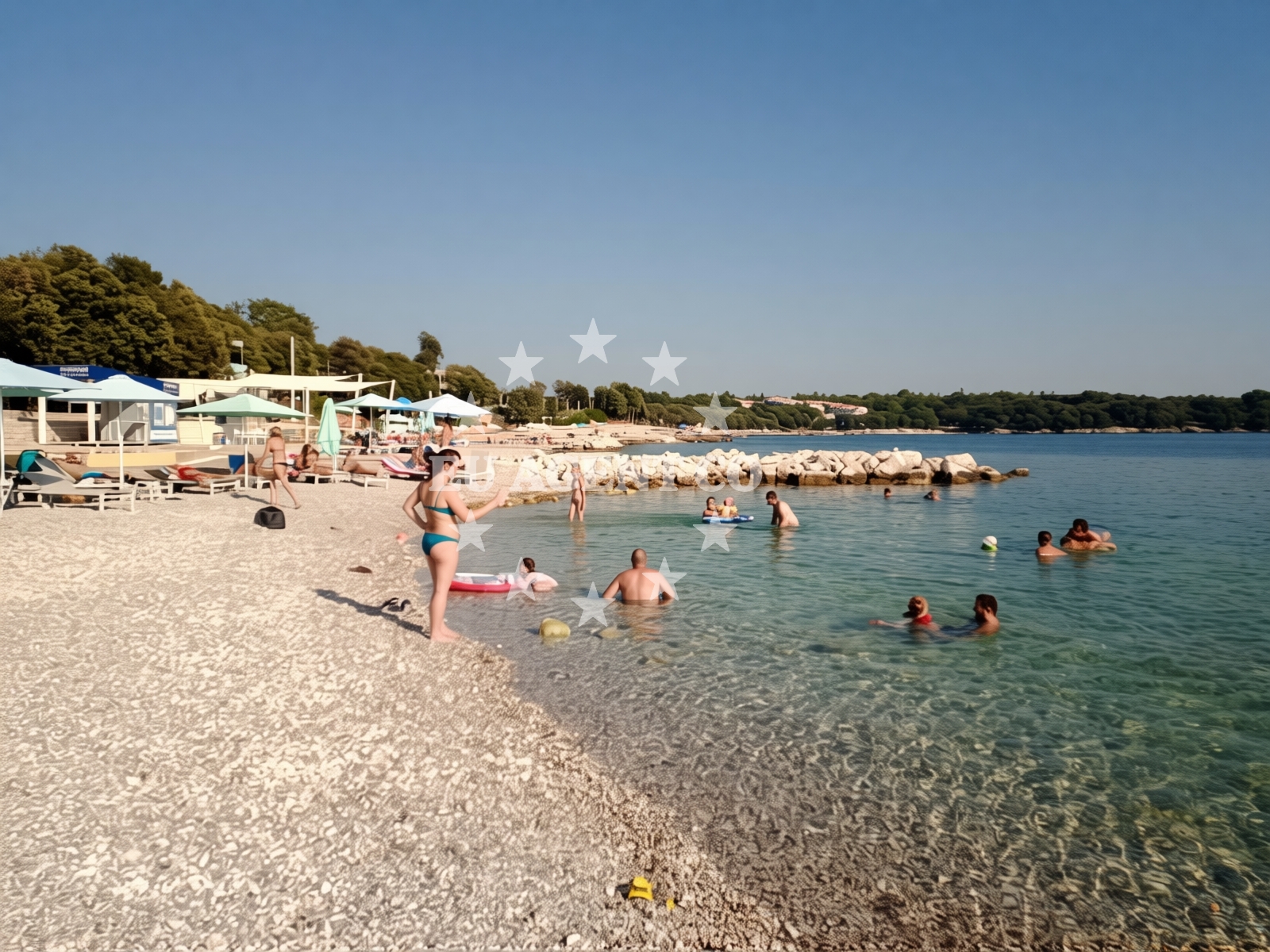 Shoreline and swimming area at Funtana beach II in 35 Grgeti, Funtana
