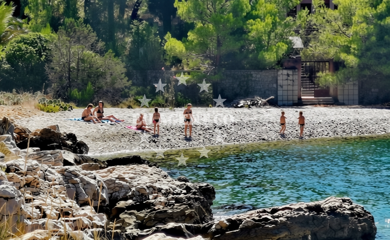 Beach facilities and surroundings at Hana beach in Vlaška I 18, Milna