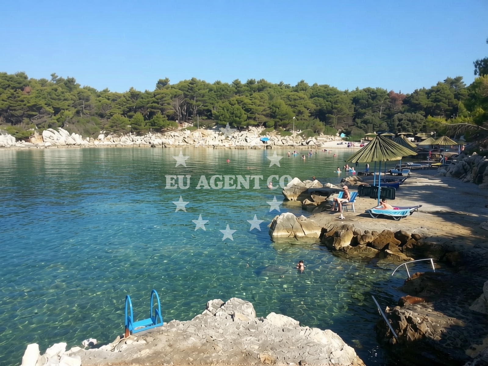 Shoreline and swimming area at Kandarola III beach in KAMPOR 68 B,E,F,G Apartments, Rab