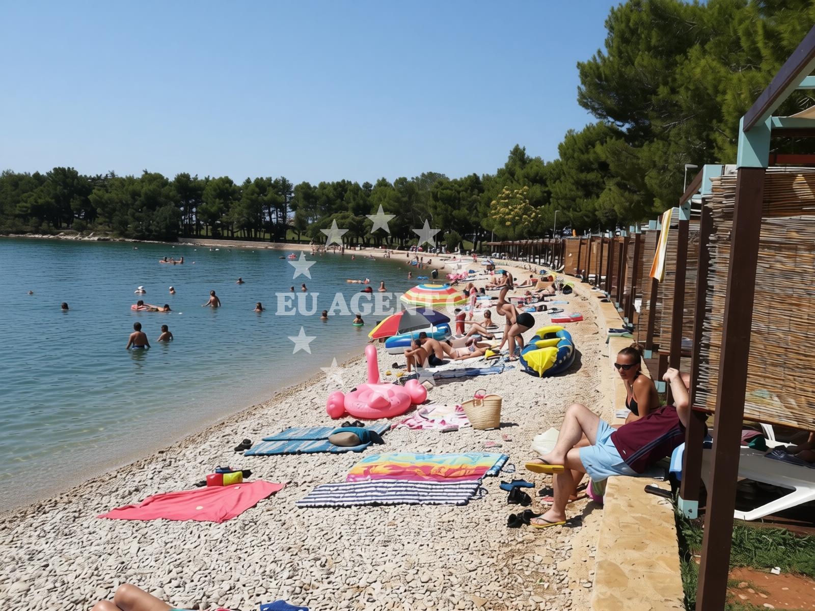 Shoreline and swimming area at Karpinjan beach in Eugena Kumičića 27, Novigrad Istria