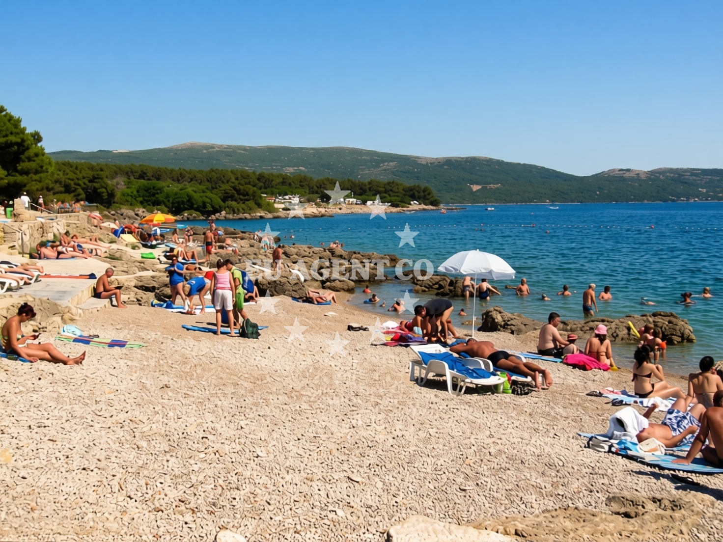 Shoreline and swimming area at Koralj Beach in , Krk
