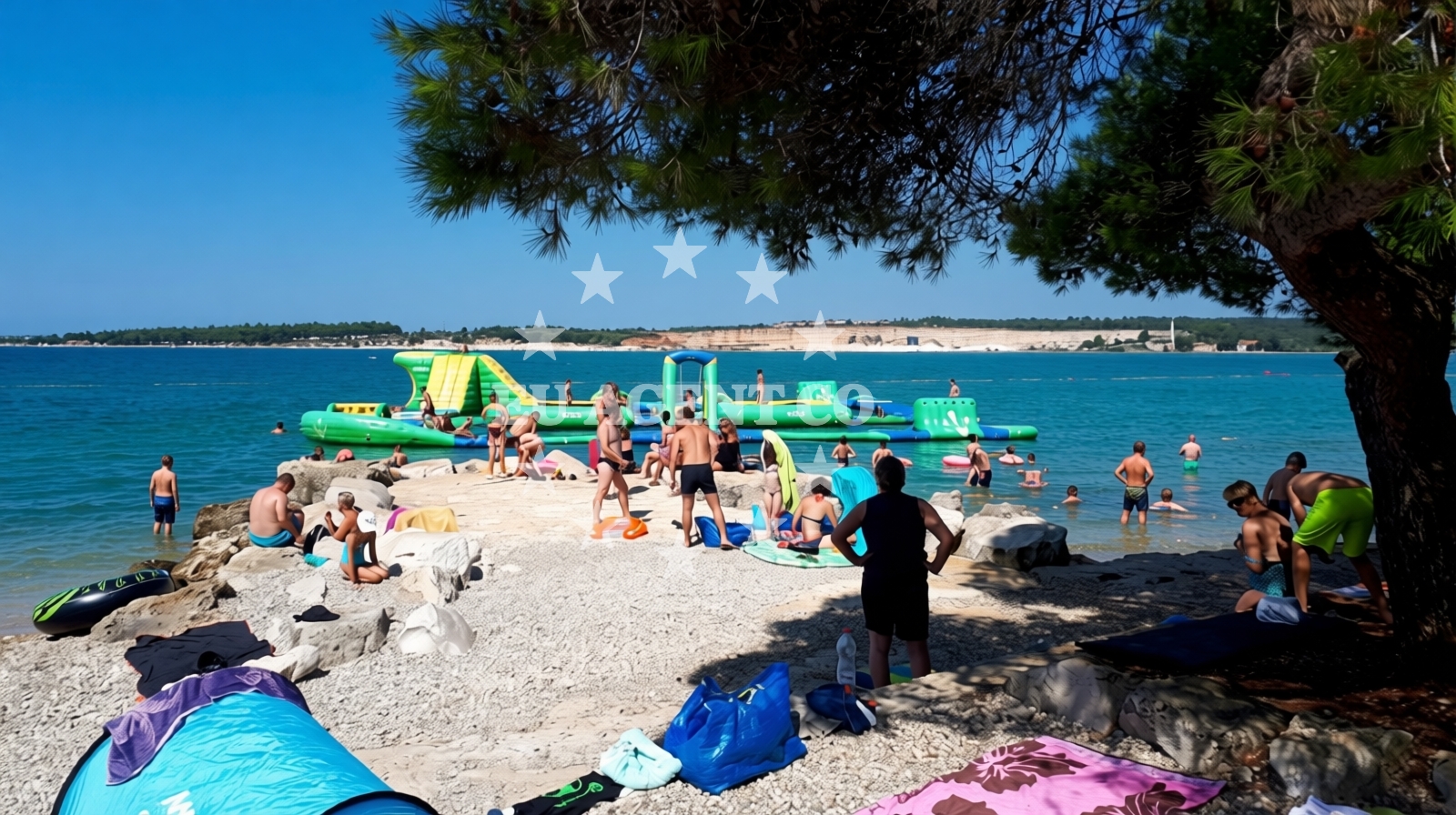 Shoreline and swimming area at Lanterna beach in Lanterna 15, Poreč