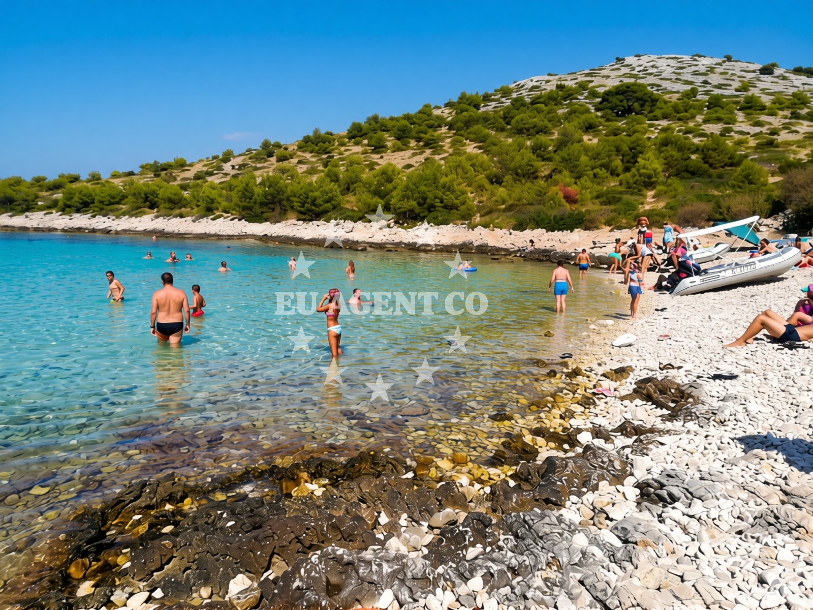 Shoreline and swimming area at Lojena beach in Otok Žut 52, Pristanišće