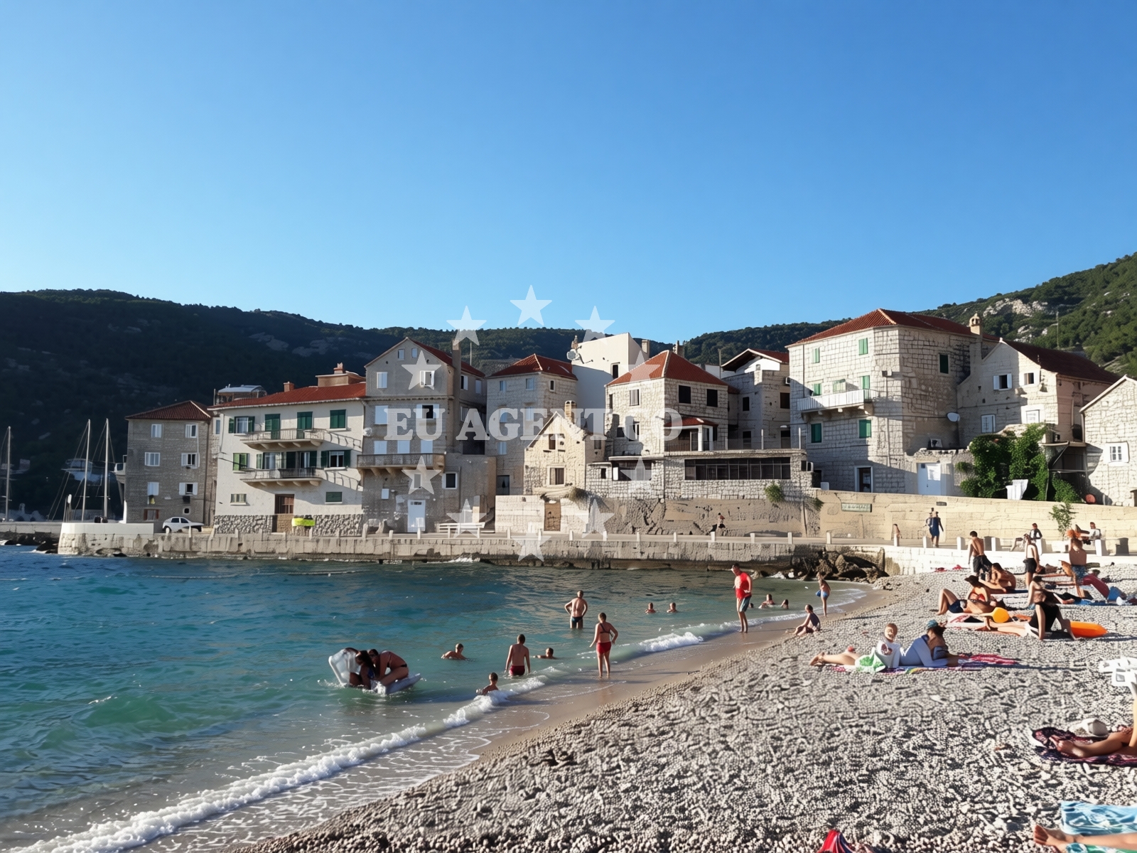 Shoreline and swimming area at Lucica beach in Tina Ujevića 15, Komiža