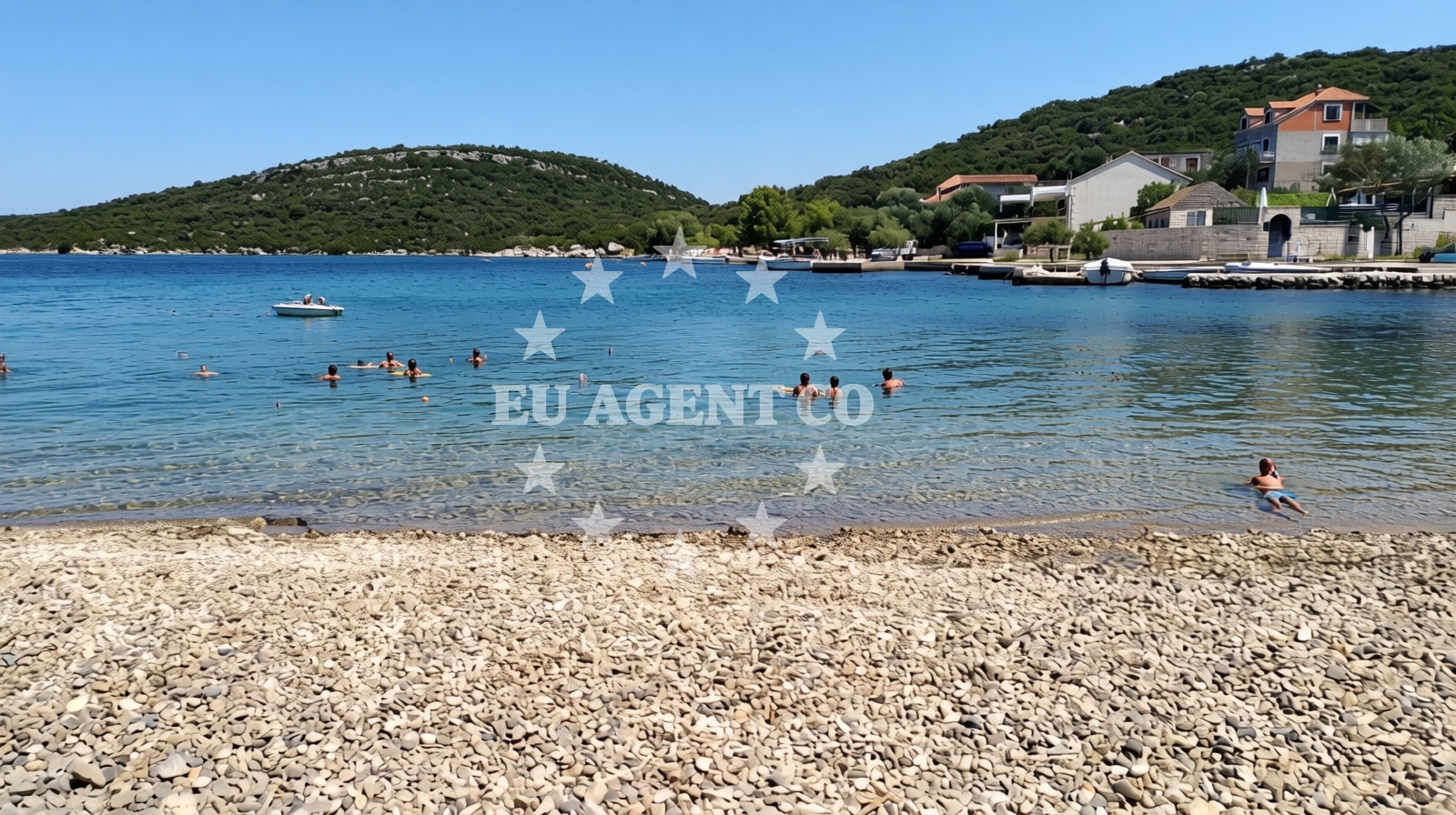 Shoreline and swimming area at Luka Dubrava beach in Sutvid 11, Dubrava