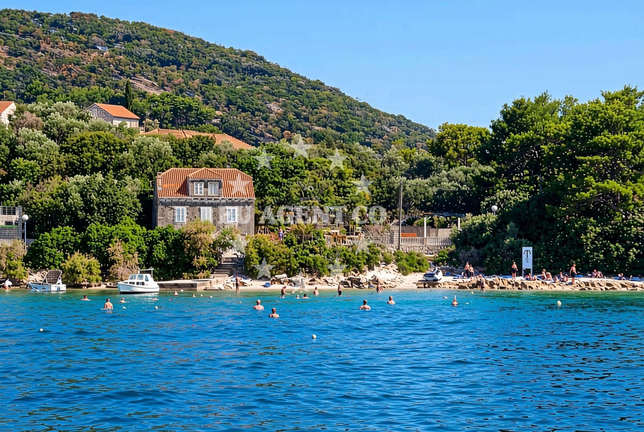 Shoreline and swimming area at Mačus, Koločep (Koločep) Beach in Mačus