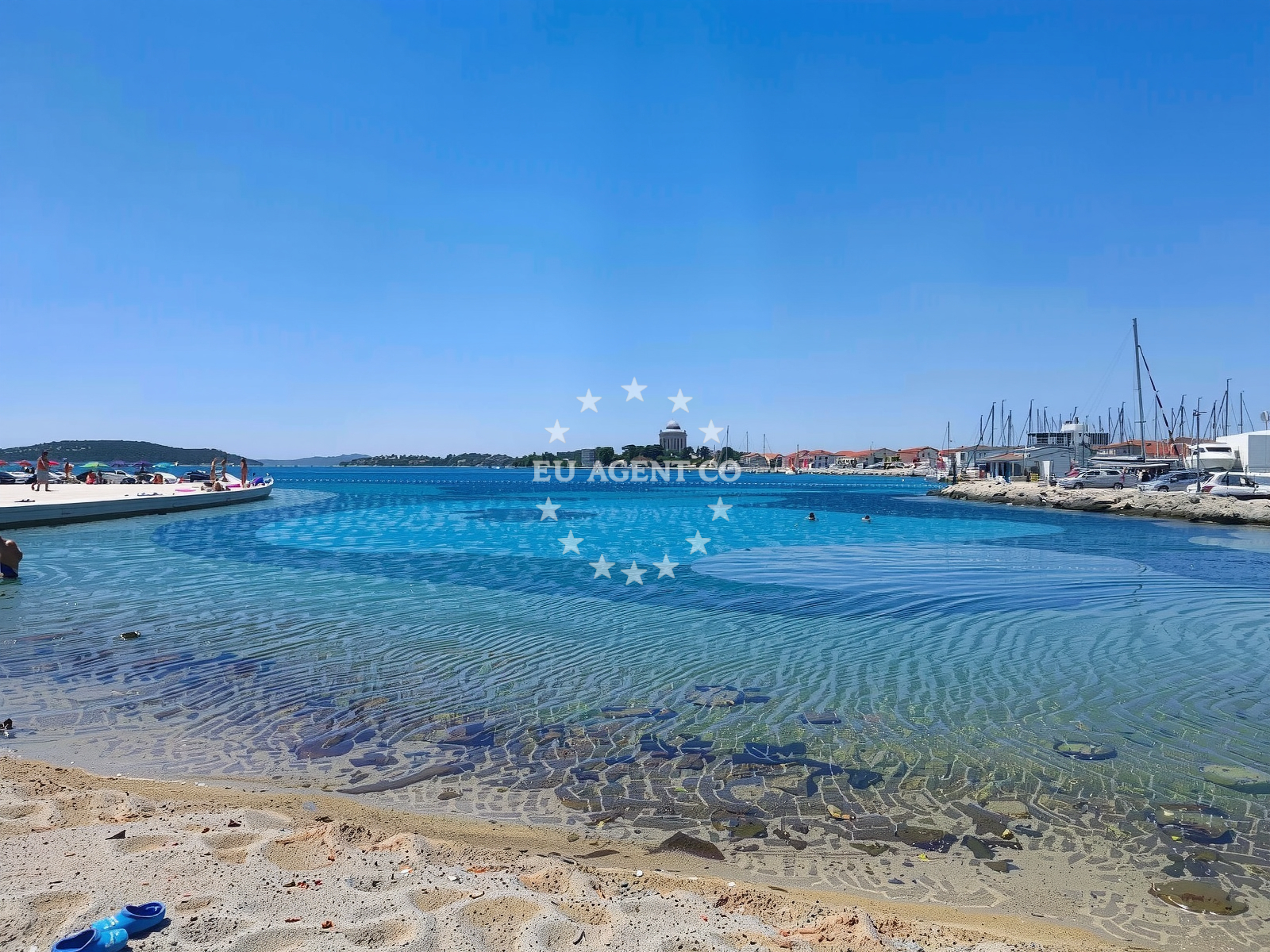 Shoreline and swimming area at Male Vrulje Beach in 11 Kraje ulica, Vodice