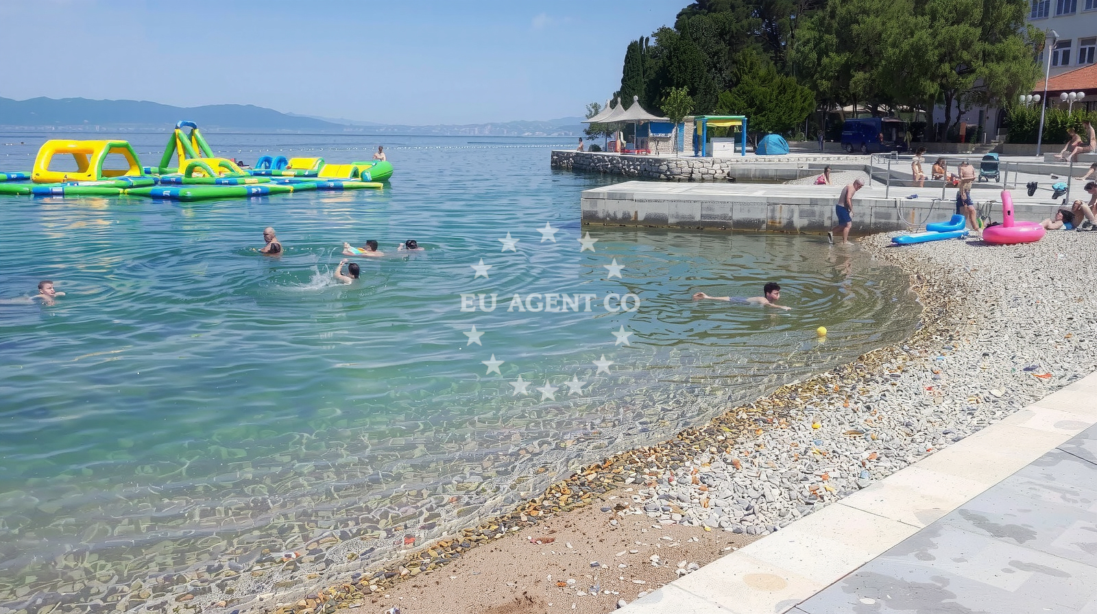Shoreline and swimming area at Malinska beach in Obala 51, Malinska