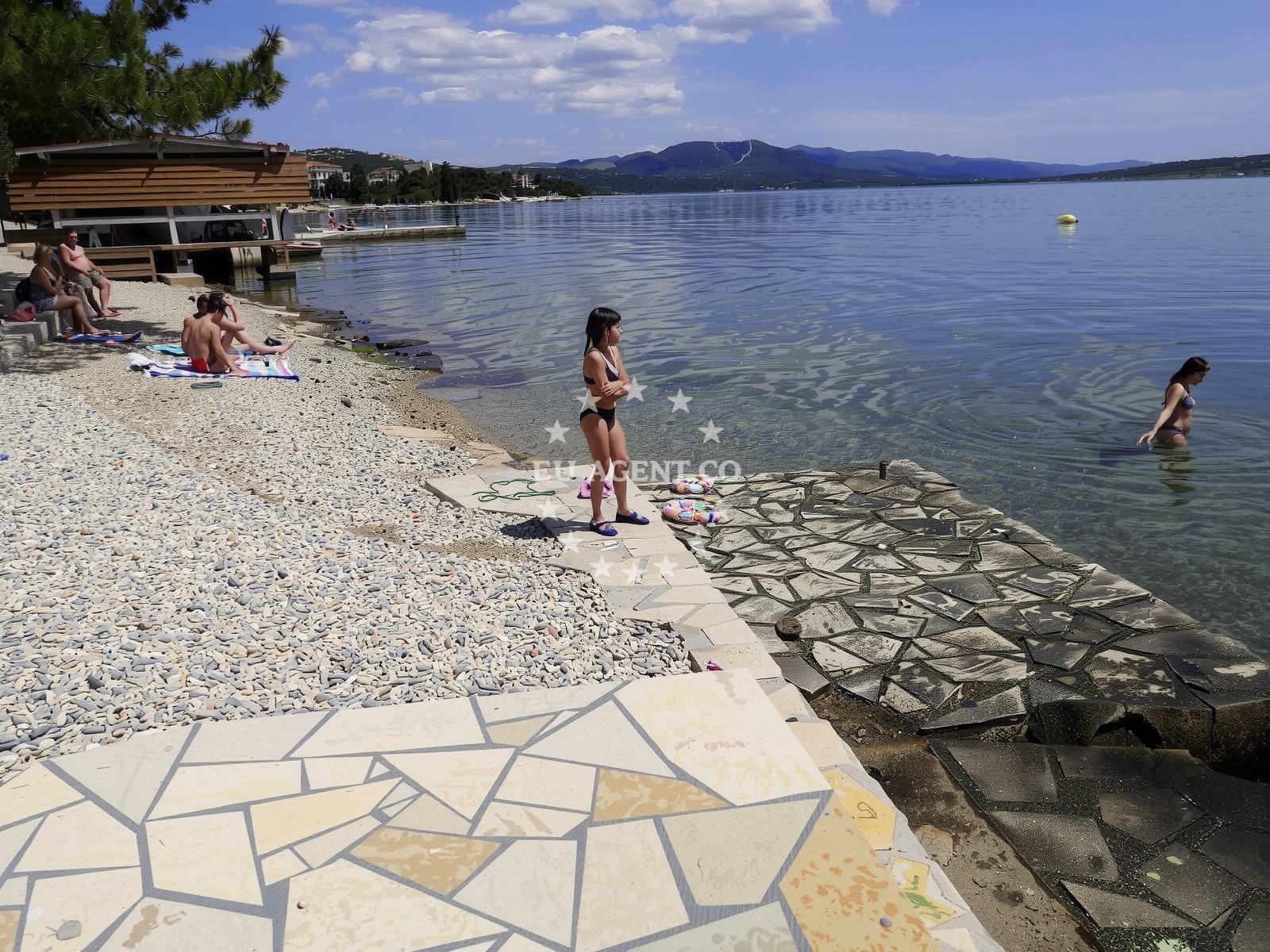 Shoreline and swimming area at Maslenica beach in Ulica Gojka Suska 37, Maslenica
